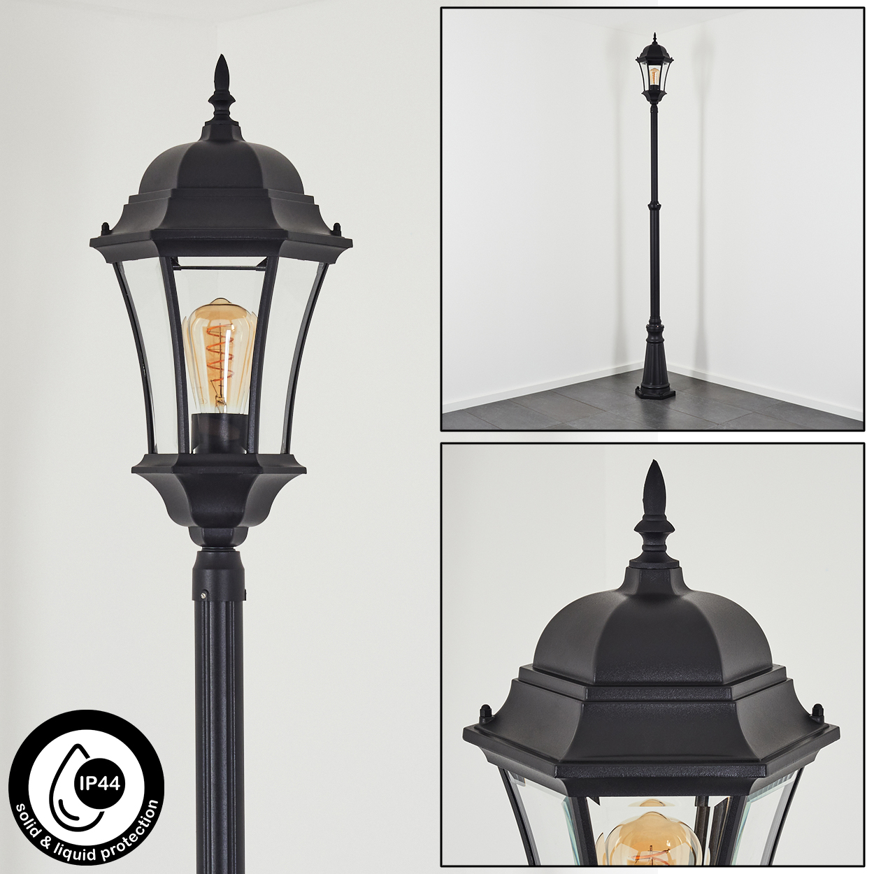 Schwarze Außenlampe mit Glasscheiben und einer warmen Glühbirne. IP44-Schutzsiegel sichtbar. Der Hintergrund zeigt eine weiße Wand und einen Boden.
