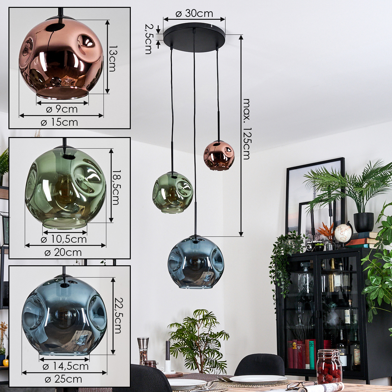 Drei kugelförmige Pendelleuchten, Kupfer, Grün und Blau, hängen von der Decke. Ein Schrank und ein Esstisch sind im Hintergrund.