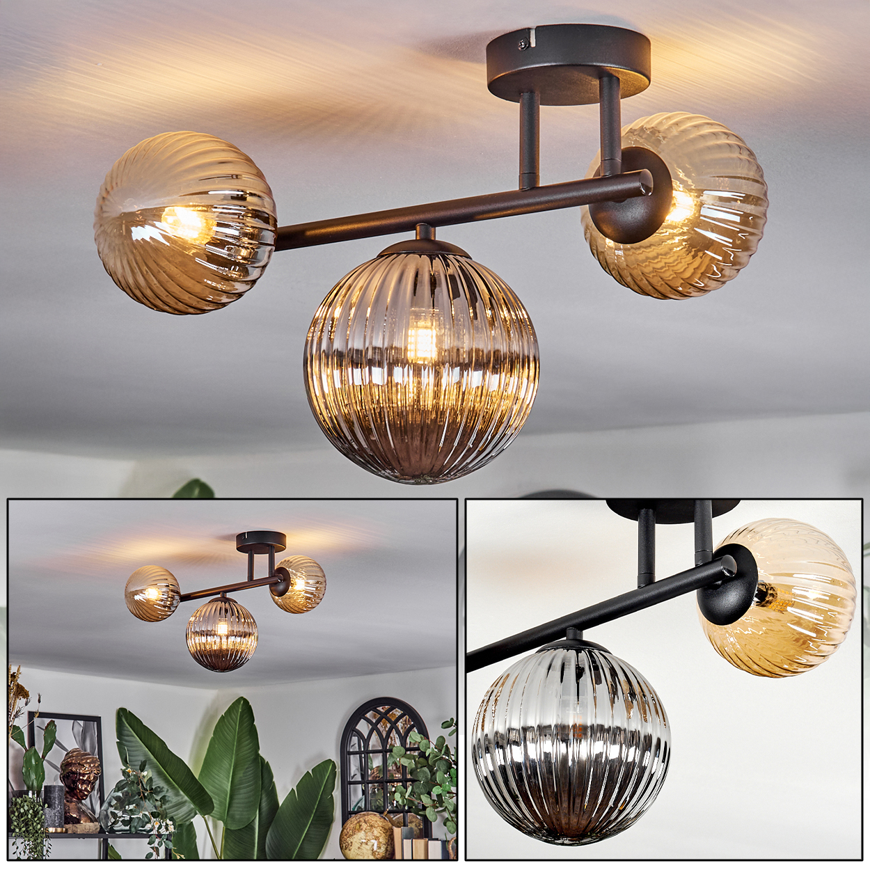 Eine moderne Deckenlampe mit drei Glaskugeln. Die Kugeln sind bernsteinfarben und klar, mit einem schwarzen Metallrahmen. Die Decke ist weiß.