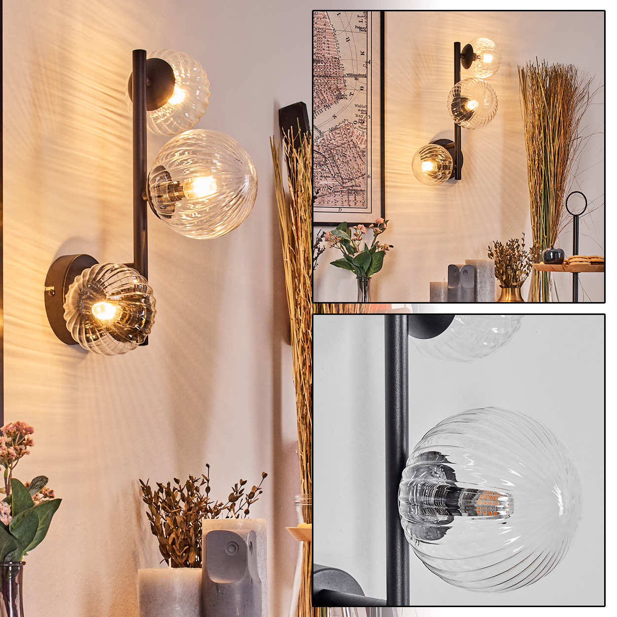 Wandlampe mit drei Glaskugeln, schwarzer Rahmen. Trockenpflanzen, Blumen in Vasen und eine Karte sind ebenfalls zu sehen.