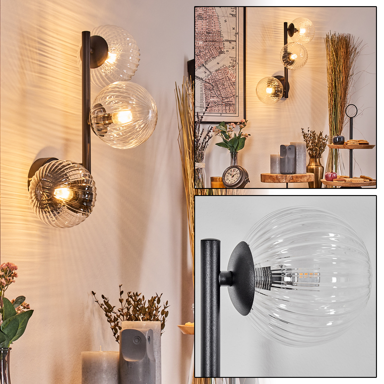 Wandleuchten mit Glaskugel-Schirmen, schwarze Metallbefestigungen. Hintergrund: Dekoration, Karte und Pflanzen. Warmes Licht.