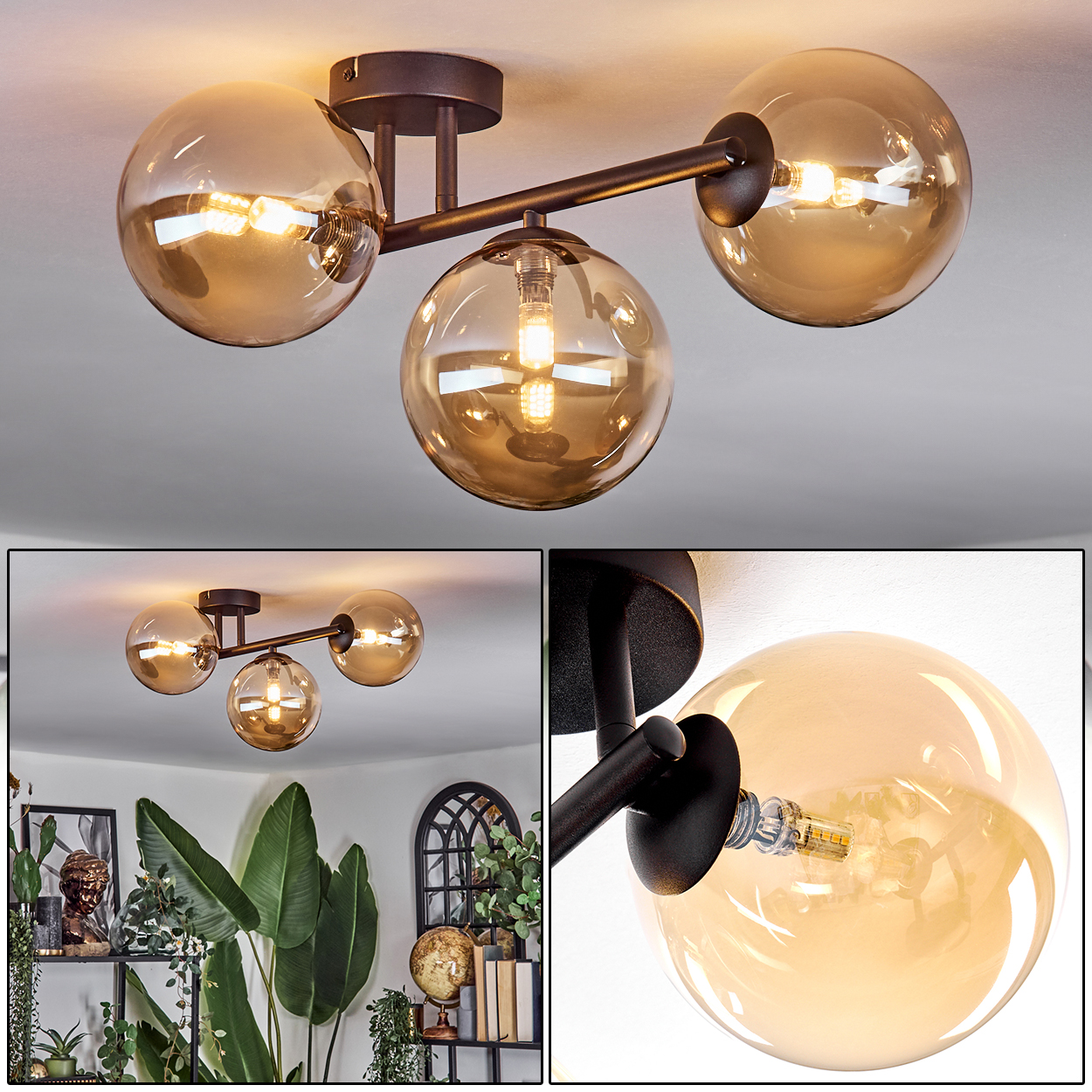 Moderne Deckenleuchte mit drei bernsteinfarbenen Glaskugeln und schwarzen Metallarmen, beleuchtet. Hintergrund: weiße Decke.
