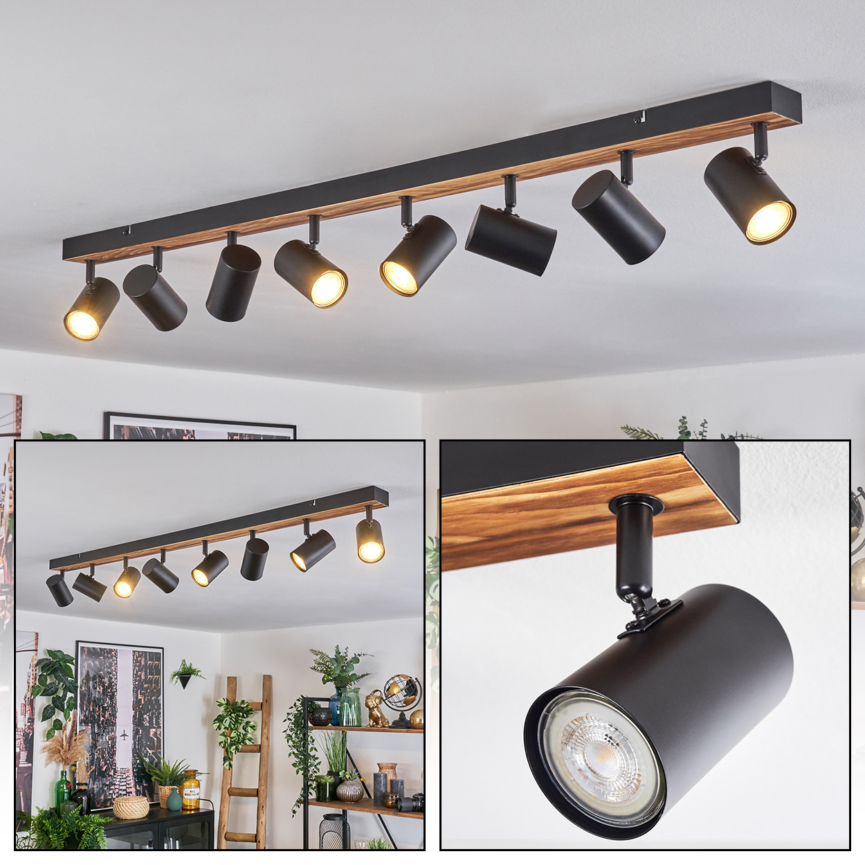 Eine moderne Deckenleuchte mit schwarzen Strahlern, die an einem Holzbalken befestigt sind, beleuchtet einen Raum. Die Lichter sind an.