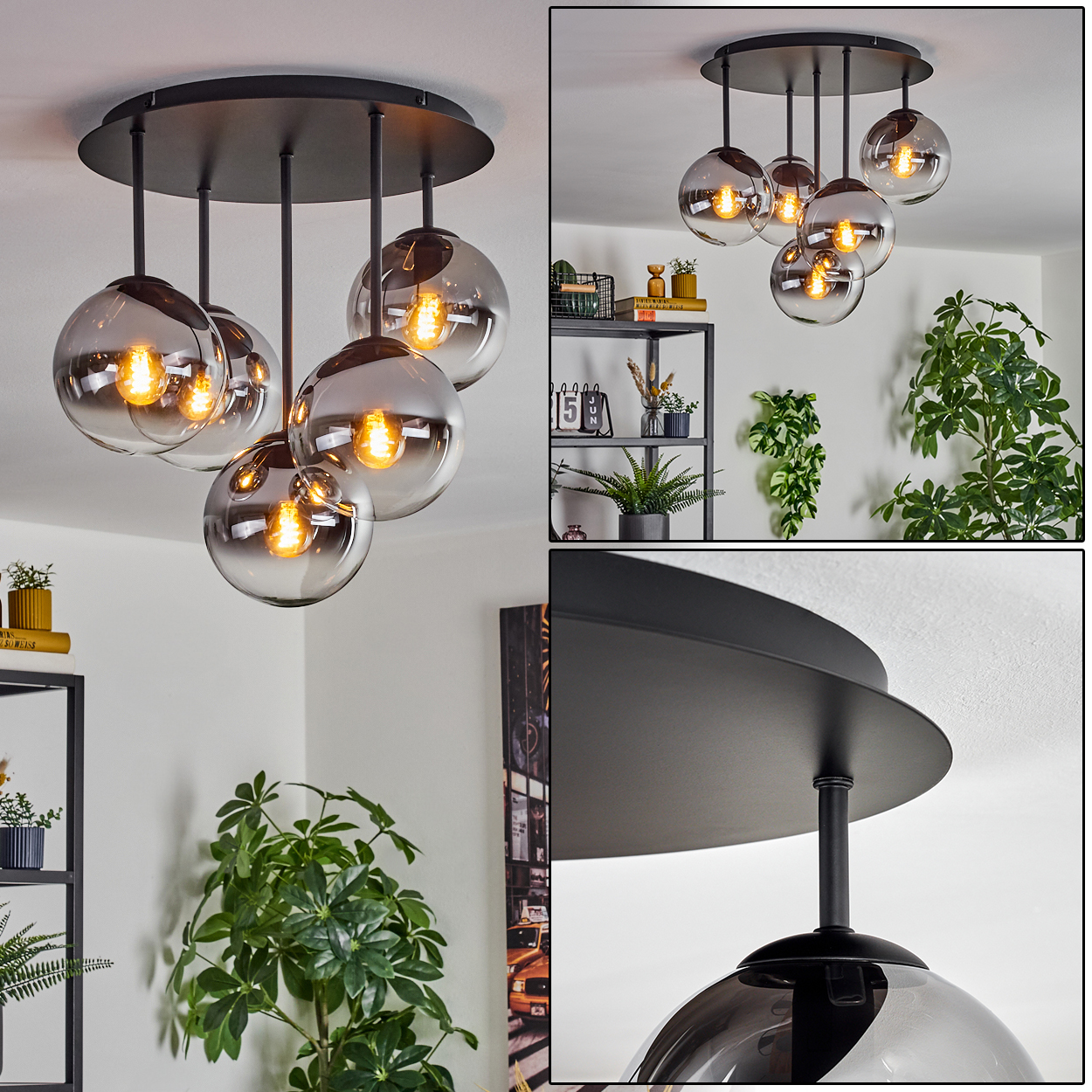 Eine moderne Deckenlampe mit sechs rauchfarbenen Glaskugelschirmen. Die Leuchte ist schwarz, die Glühbirnen leuchten. Pflanzen und Dekoration im Hintergrund.