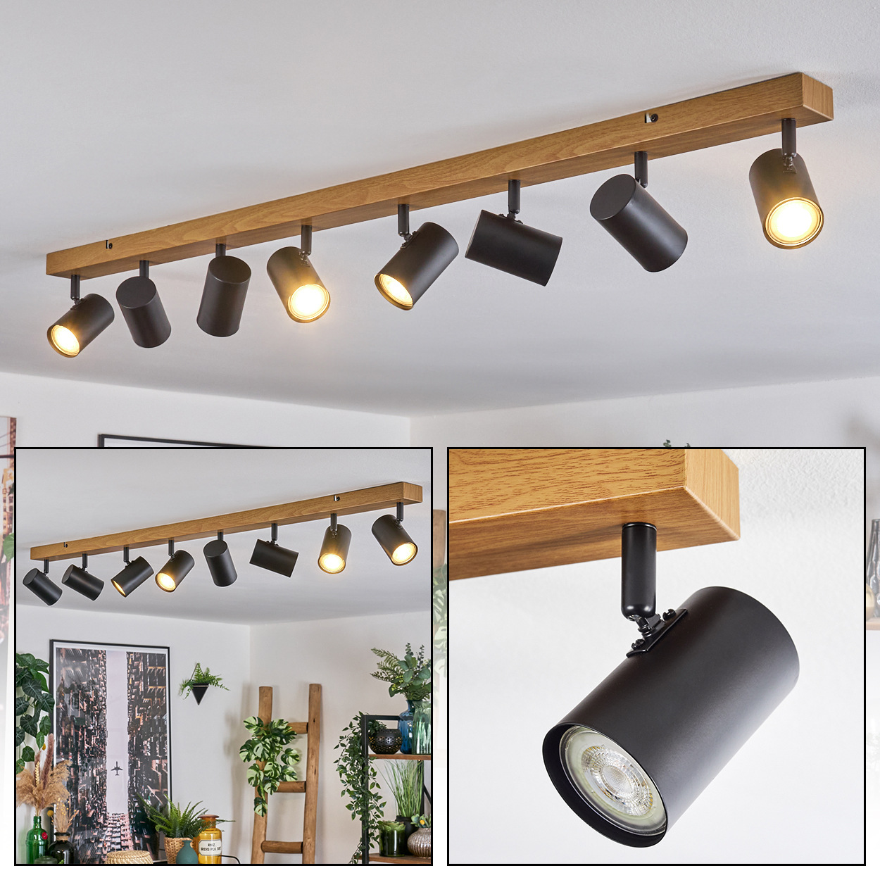 Eine Deckenleuchte mit sieben schwarzen Strahlern, die an einem Holzbalken befestigt sind. Die Lichter sind an und beleuchten den Raum darunter.