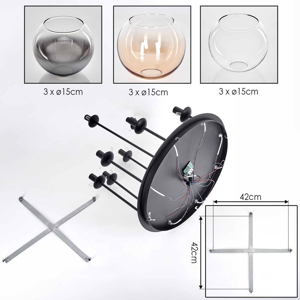 Das Bild zeigt Lampenkomponenten: Glasschalen, einen schwarzen kreisförmigen Rahmen mit Stäben und ein Metallkreuzgestell.