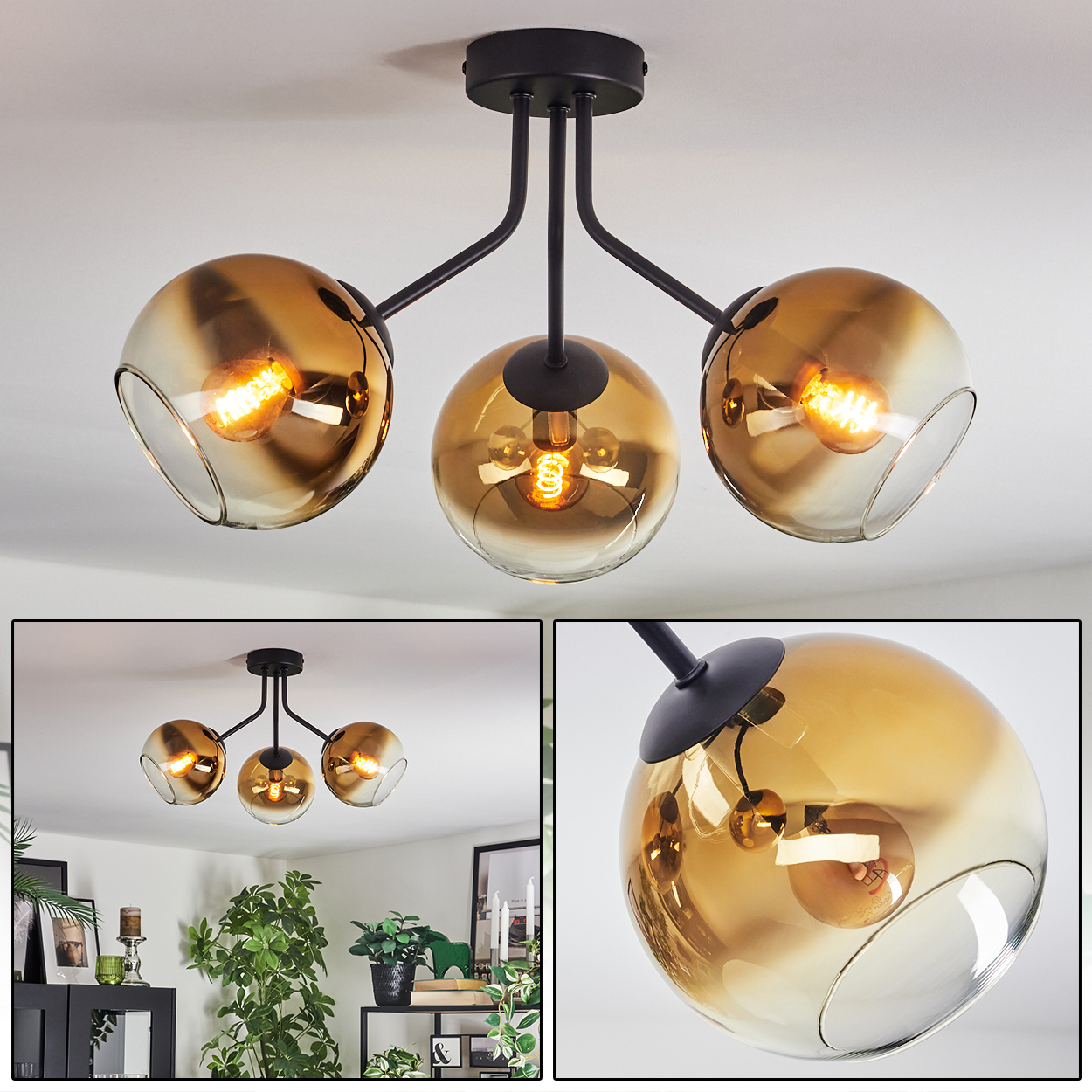 Moderne Deckenlampe mit drei bernsteinfarbenen Glaskugeln, schwarzen Armen und einem schwarzen Sockel. Die Glühbirnen sind beleuchtet.