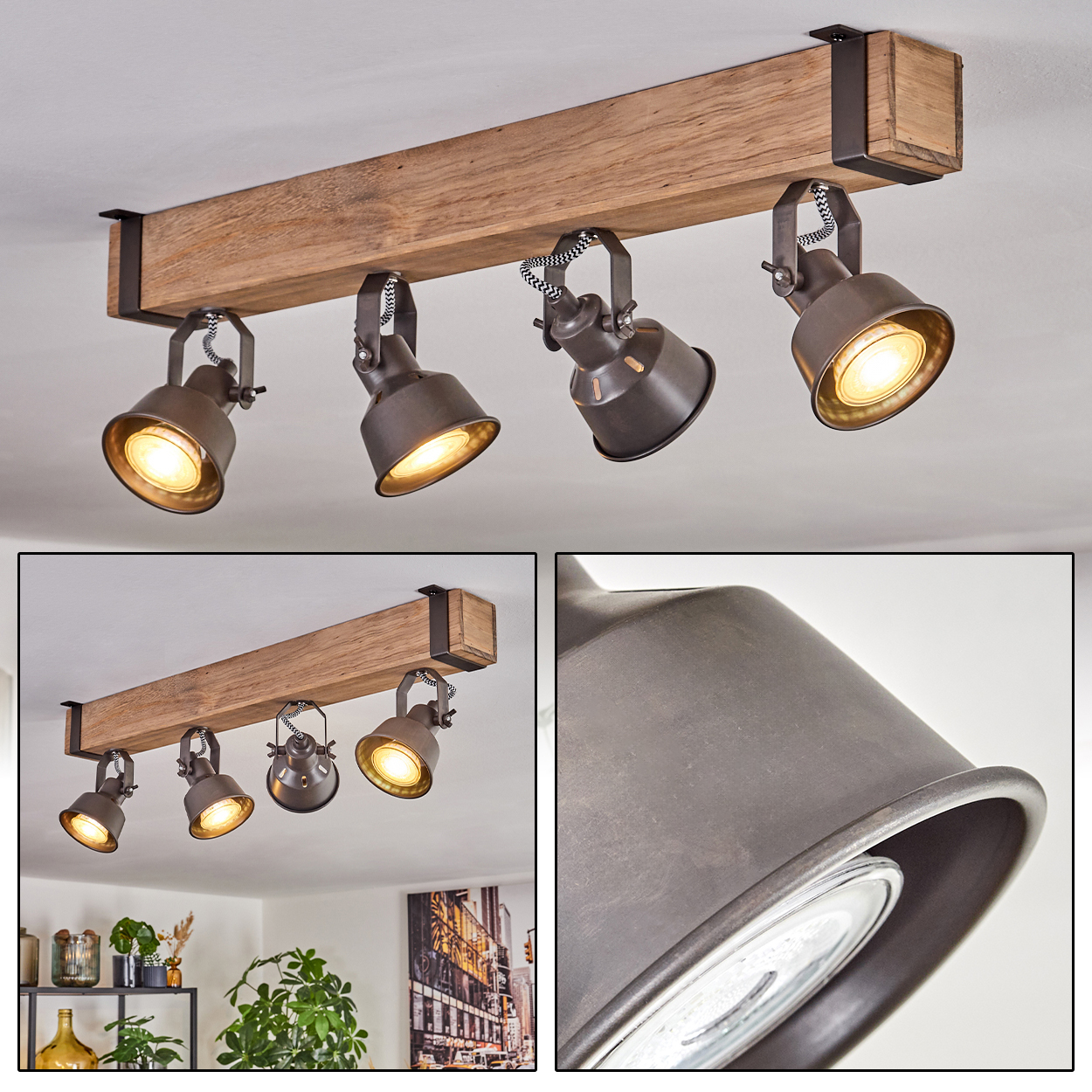 Deckenstrahler mit vier dunklen Metalllampen auf einem Holzbalken. Die Lampen sind beleuchtet, der Hintergrund ist eine weiße Decke.