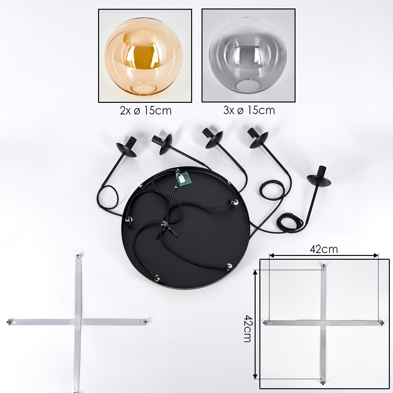 Draufsicht auf eine zerlegte Deckenlampe mit zwei Glaskugeln, einer schwarzen kreisförmigen Basis und Metallkreuzstütze.