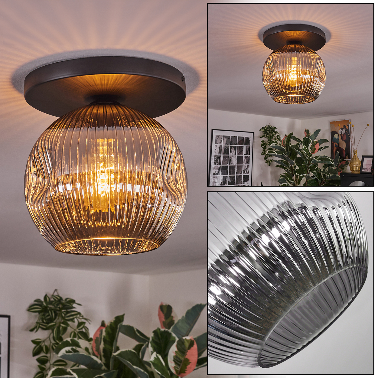Nahaufnahme einer Deckenleuchte. Sie hat einen runden, geriffelten Glasschirm und einen dunklen Metallsockel. Pflanzen sind unten sichtbar.