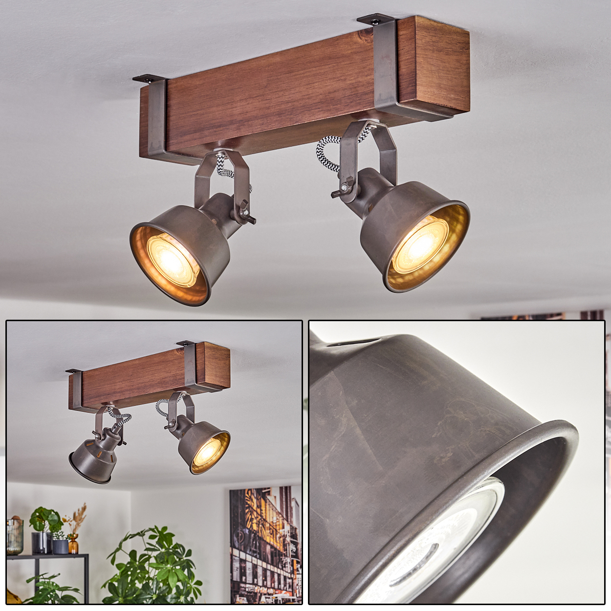 Eine Deckenleuchte mit zwei Scheinwerfern. Die Leuchte hat einen Holzbalken mit Metallstützen. Die Scheinwerfer sind an.