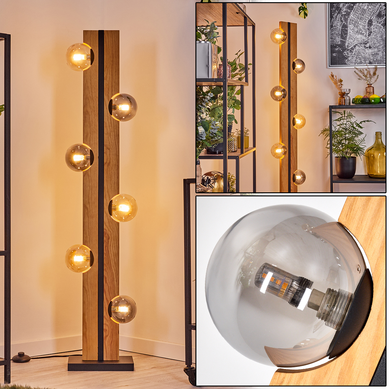 Eine moderne Stehlampe mit Holzbalken und runden Glaskugeln. Im Hintergrund Regale mit Pflanzen und Dekoration.