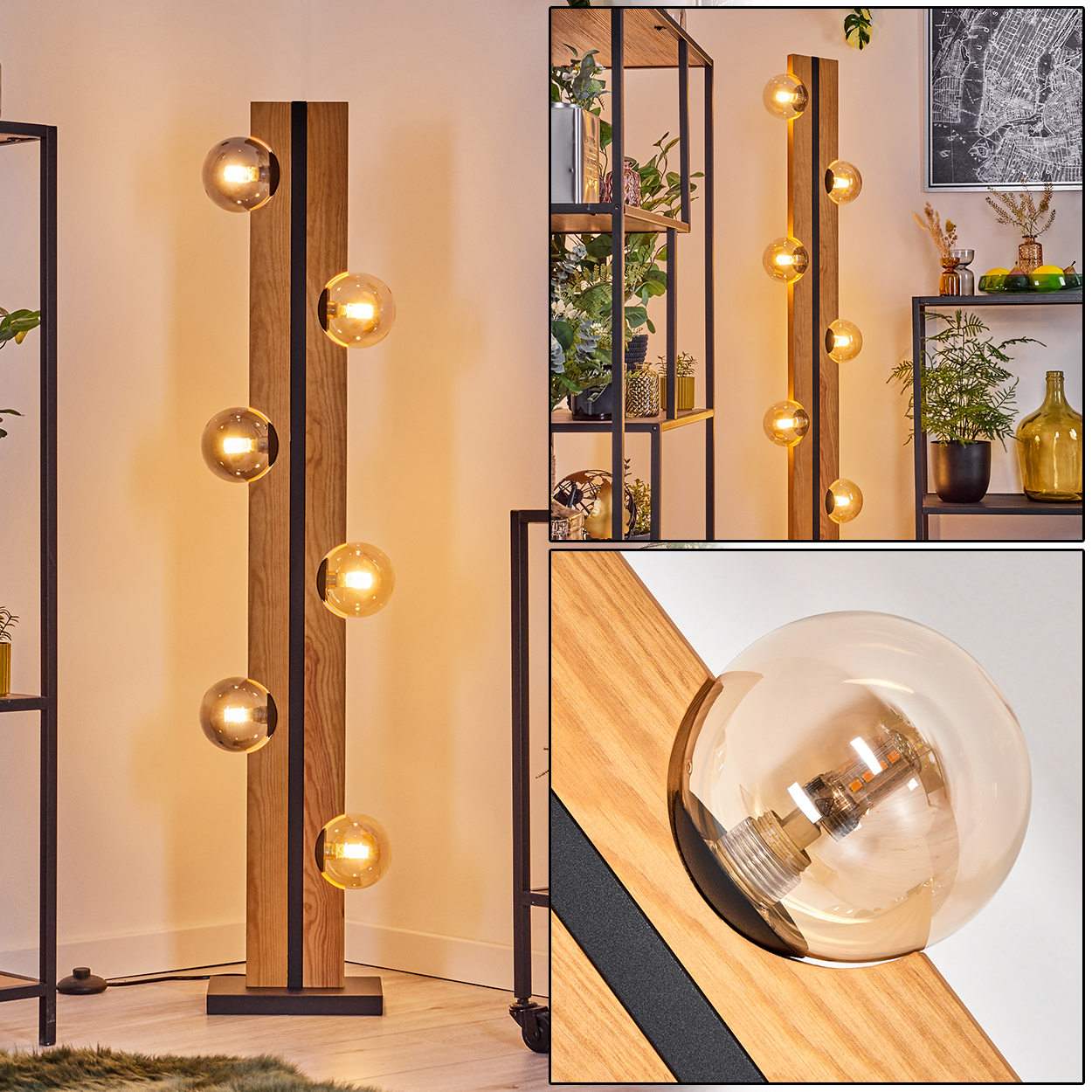Eine Holz-Stehlampe mit Glaskugelleuchten. Die Lampe steht in einem Raum mit Regalen und Pflanzen. Eine Nahaufnahme zeigt ein Licht.