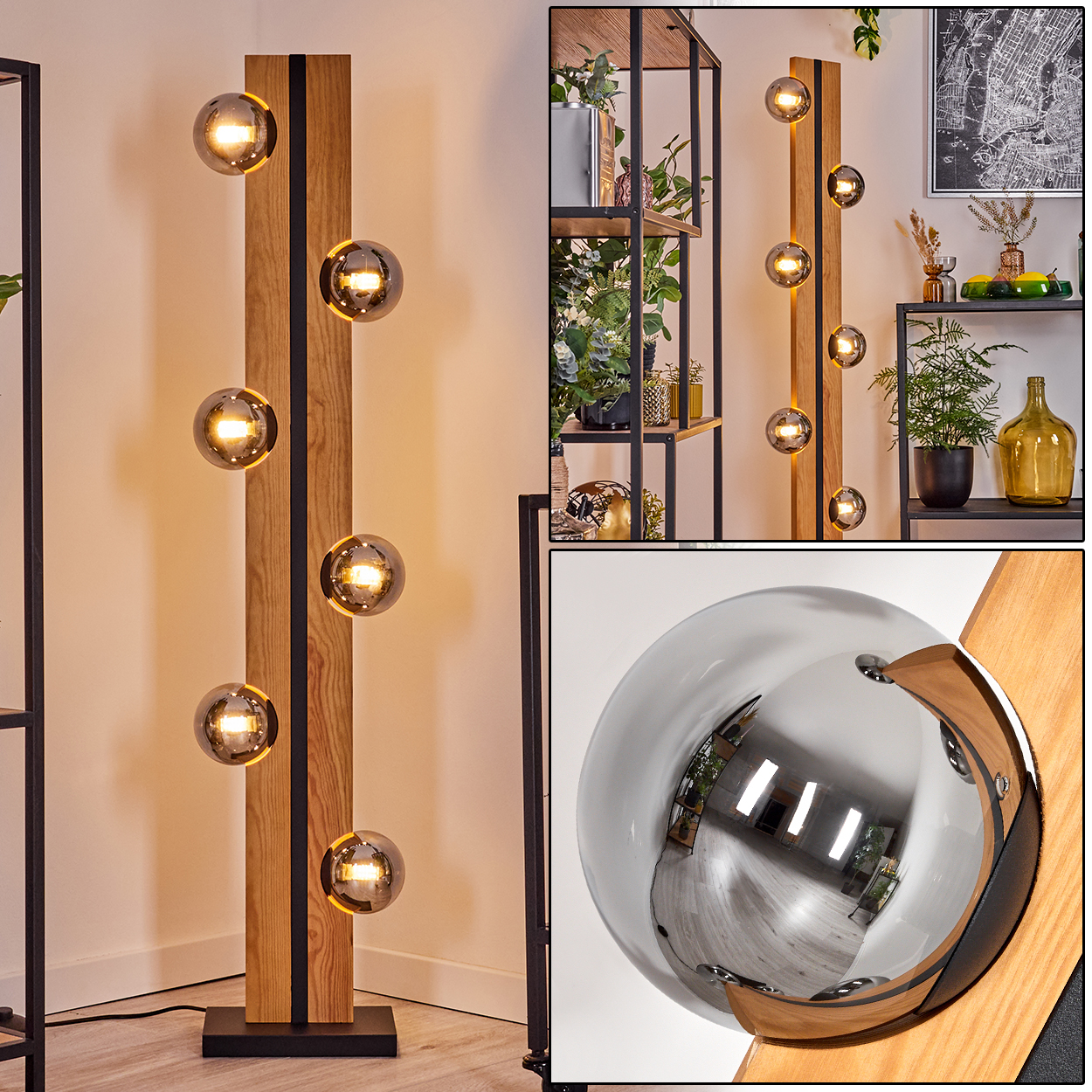 Eine moderne Stehlampe mit kugelförmigen Lichtern. Sie hat eine Holzstruktur mit schwarzen Akzenten und eine reflektierende Kugel.