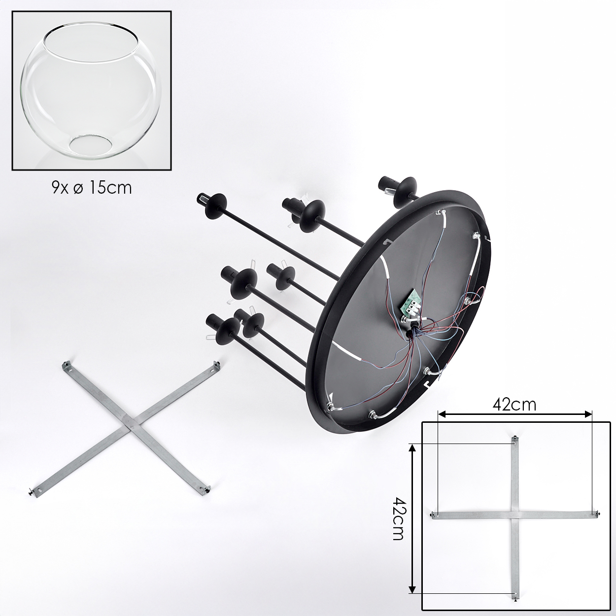 Zerlegte schwarze Leuchte mit Glasschalen. Teile umfassen eine Basis mit Drähten, Metallarmen und einen kreuzförmigen Metallständer.