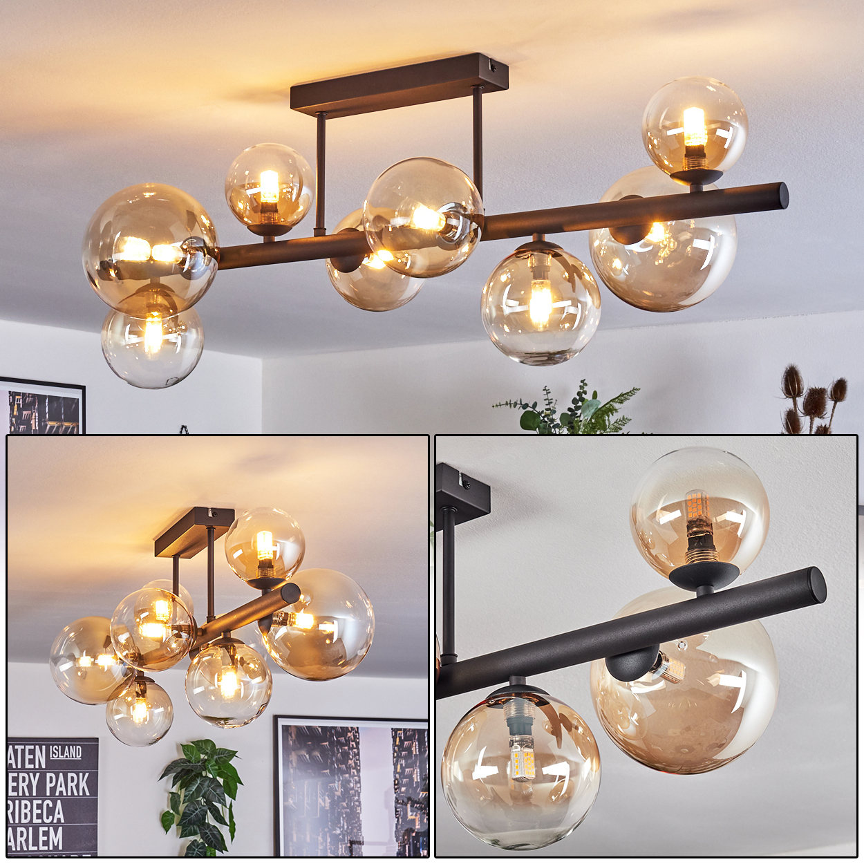 Eine moderne Deckenleuchte mit mehreren leuchtenden bernsteinfarbenen Glaskugeln. Sie hängt von der Decke, mit schwarzen Metallstützstangen.