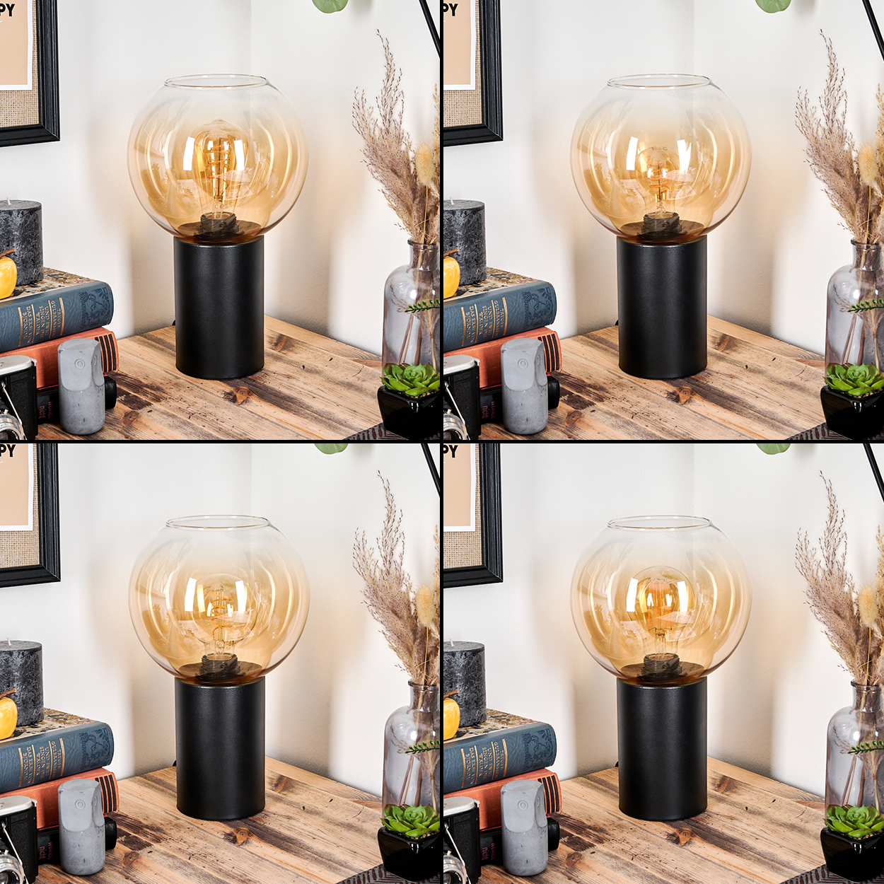 Eine moderne Lampe mit kugelförmigem Glasschirm, die auf einem schwarzen Sockel steht, auf einem Holztisch mit Büchern und einer Vase.