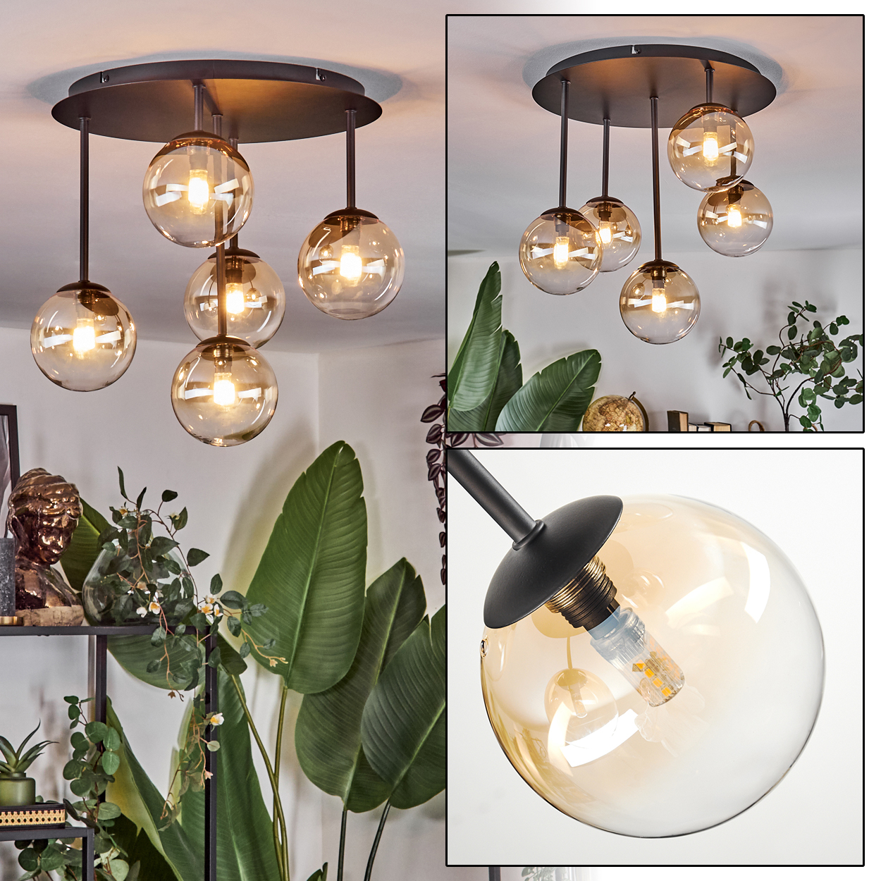 Eine moderne Deckenlampe mit sechs bernsteinfarbenen Glaskugeln. Grüne Pflanzen im Vordergrund, Regal und Büste im Hintergrund.