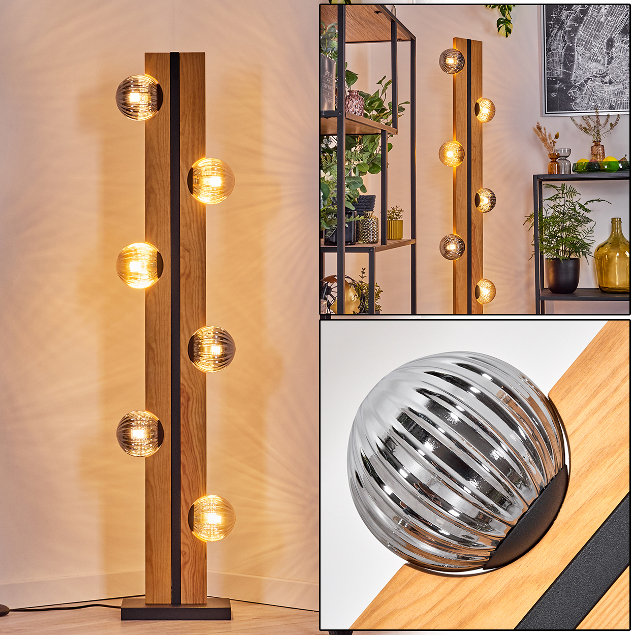 Eine moderne Stehlampe mit Glaskugelleuchten. Die Lampe ist aus Holz mit schwarzen Akzenten. Regale mit Pflanzen im Hintergrund.
