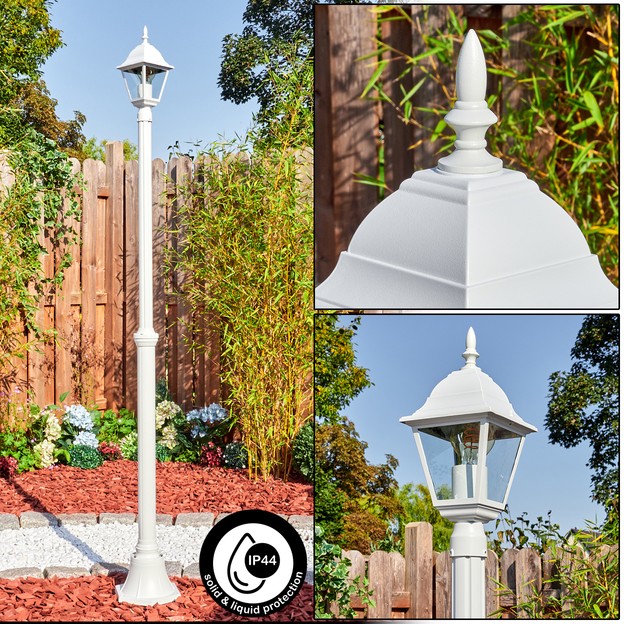 Weiße Außenlaterne in einem Garten, mit Holzzaun und Pflanzen im Hintergrund. IP44-Symbol vorhanden.