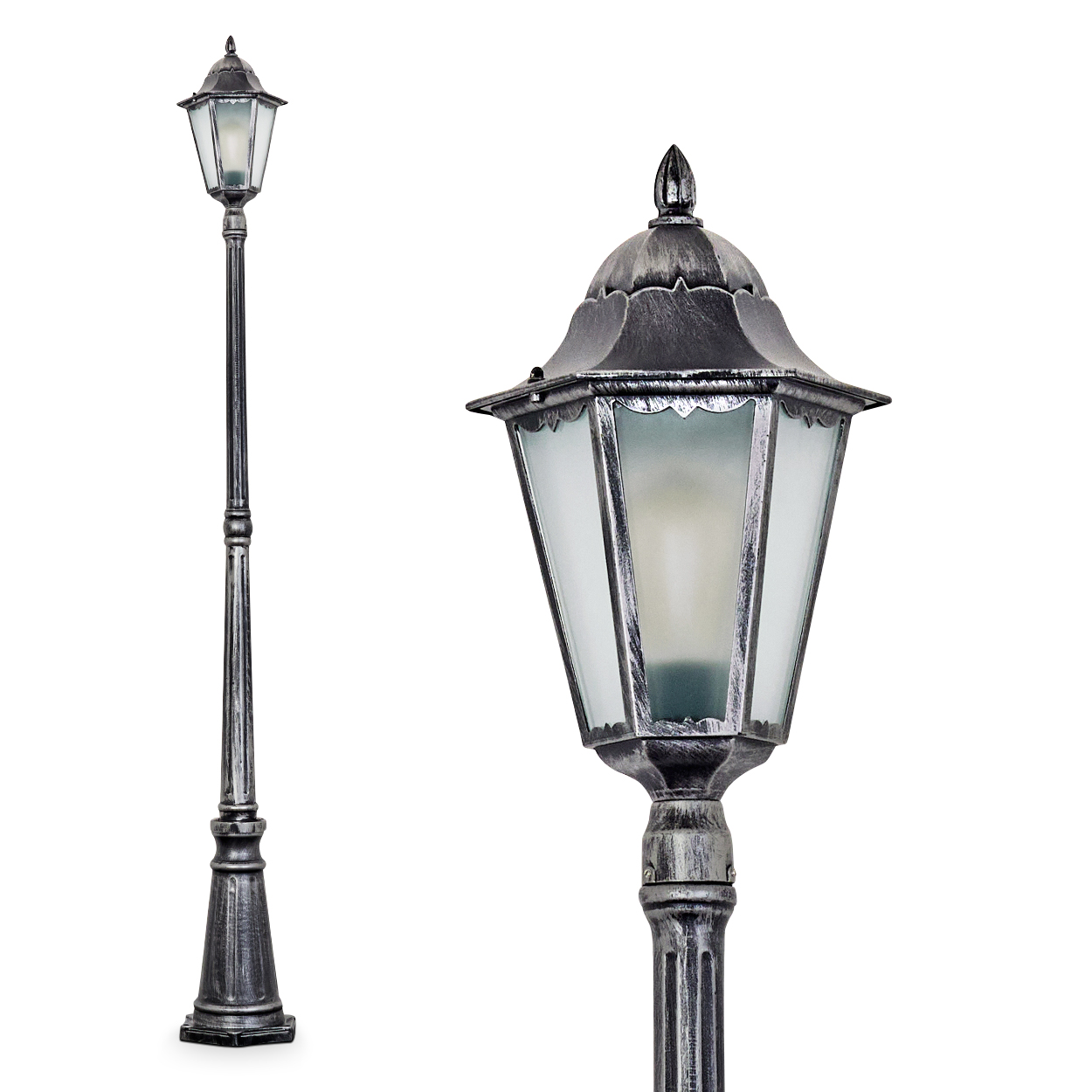 Eine dekorative silberne Straßenlaterne auf weißem Hintergrund. Die Lampe hat einen sechseckigen Glasschirm und eine spitze Spitze.