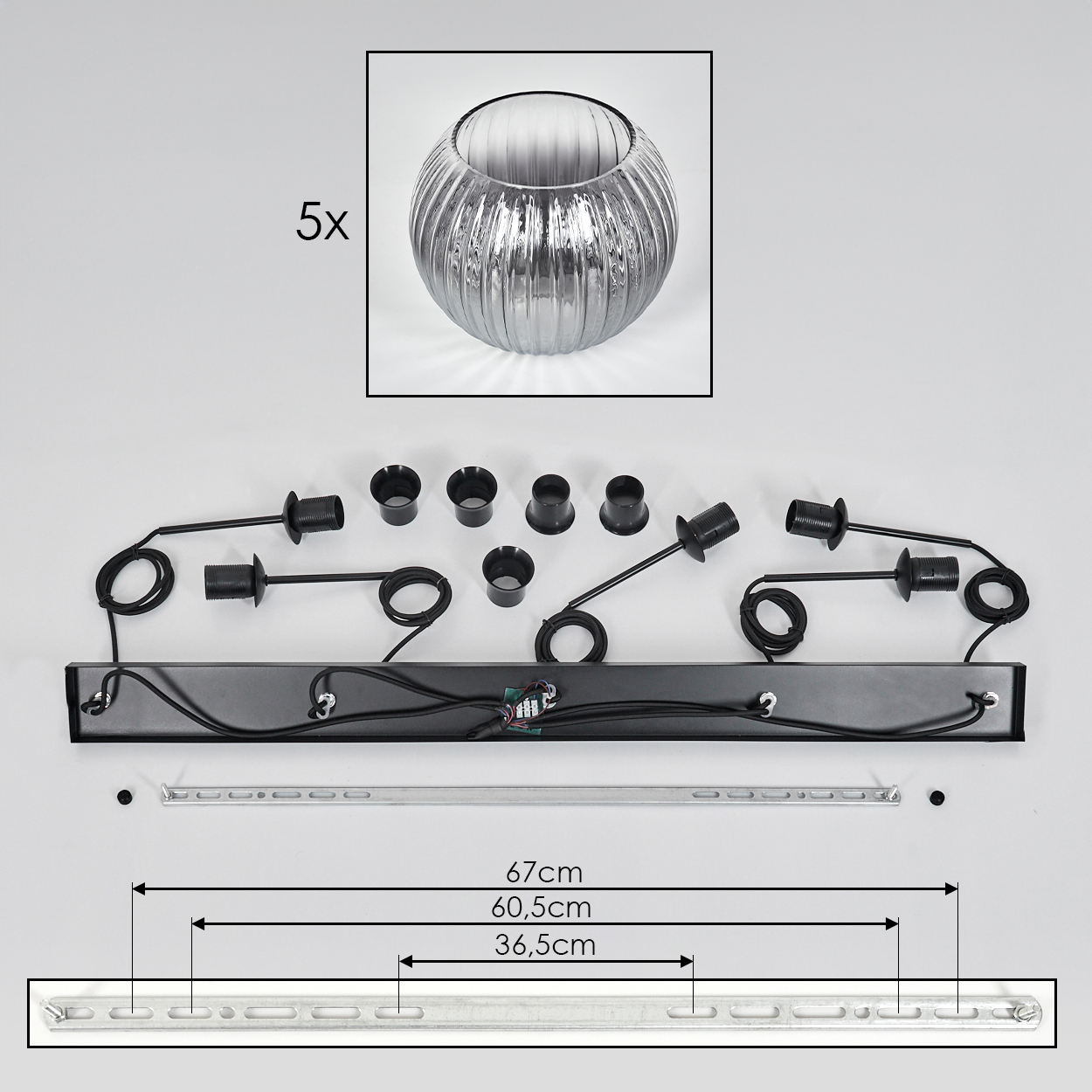 Ein zerlegtes Lampenset, darunter Glasschale, schwarze Lampenfassungen, Metallstange und Maßangaben. Komponenten liegen auf weißem Untergrund.