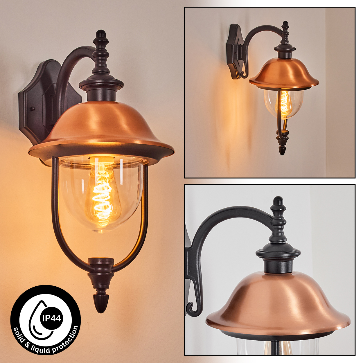 Eine kupferfarbene Außenlampe mit schwarzem Rahmen und dekorativer Glühbirne an einer beigen Wand.