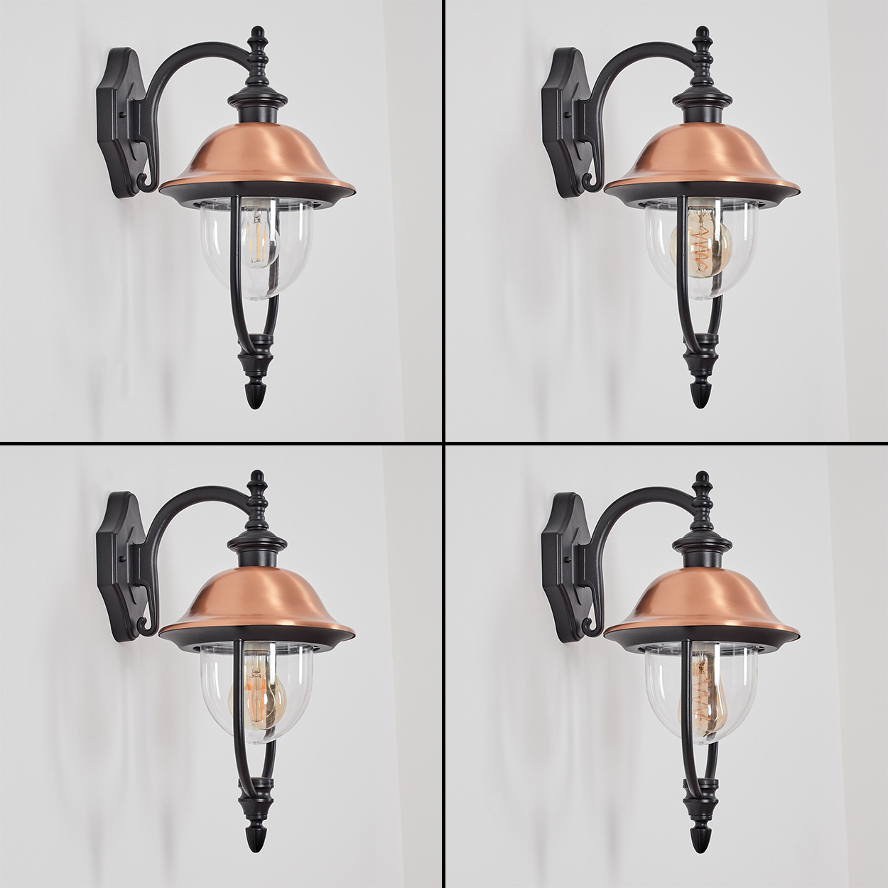 Vier Wandleuchten für den Außenbereich. Jede hat einen kupferfarbenen Schirm, klares Glas und einen schwarzen Metallrahmen. Sie sind an einer weißen Wand.