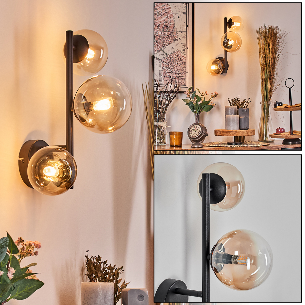 Wandlampen mit drei Glaskugeln. Im Hintergrund eine Karte und Dekoration. Die Lampen sind bronzefarben mit schwarzem Träger.