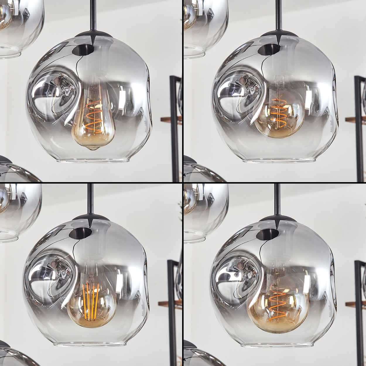 Vier moderne Leuchten mit rauchfarbenen Glasschirmen und freiliegenden Glühfäden. Schwarze Tragstrukturen sind sichtbar.