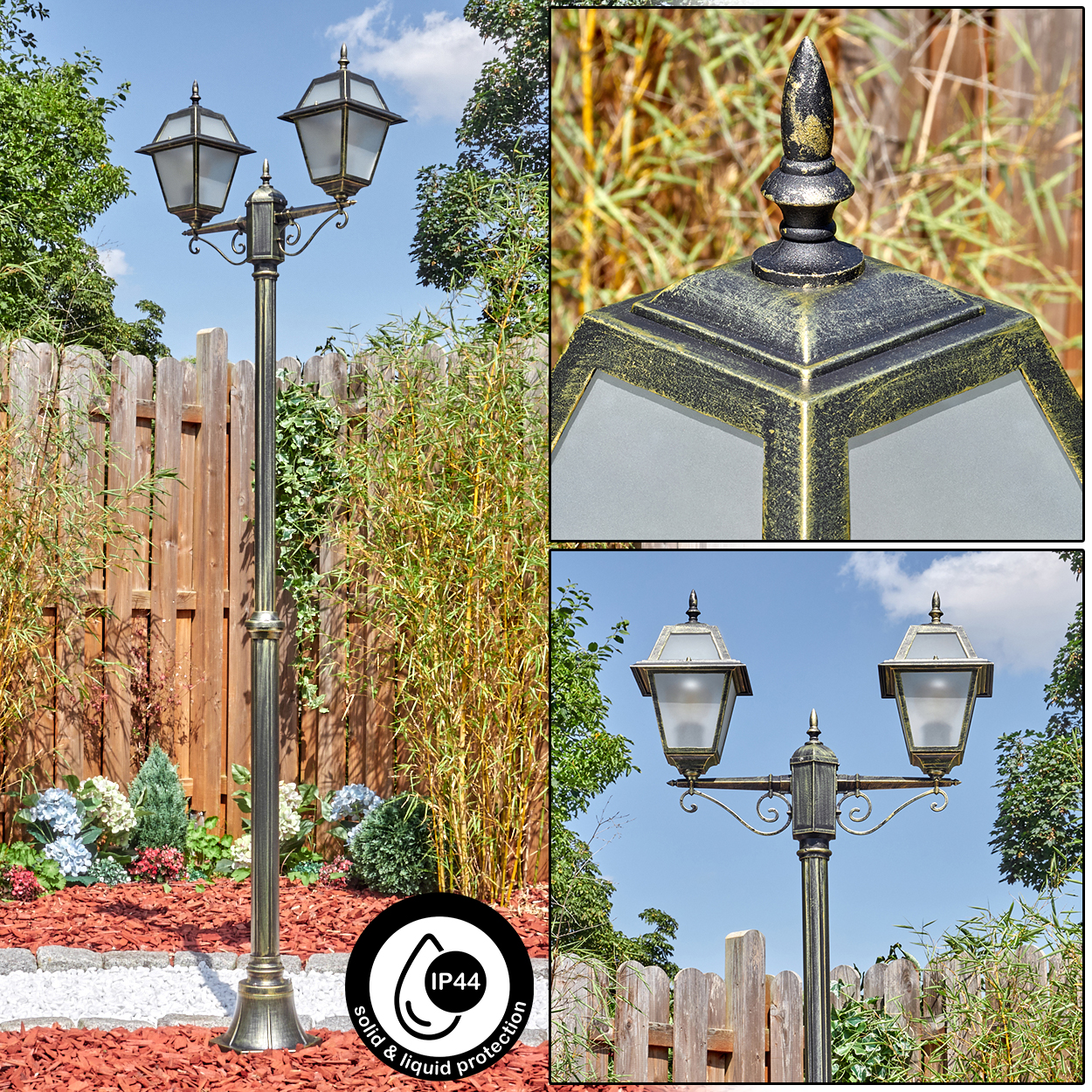 Eine bronzefarbene Außenlampe mit zwei Lichtern, platziert in einem Garten mit Bambus, Holzzaun und blauem Himmel.