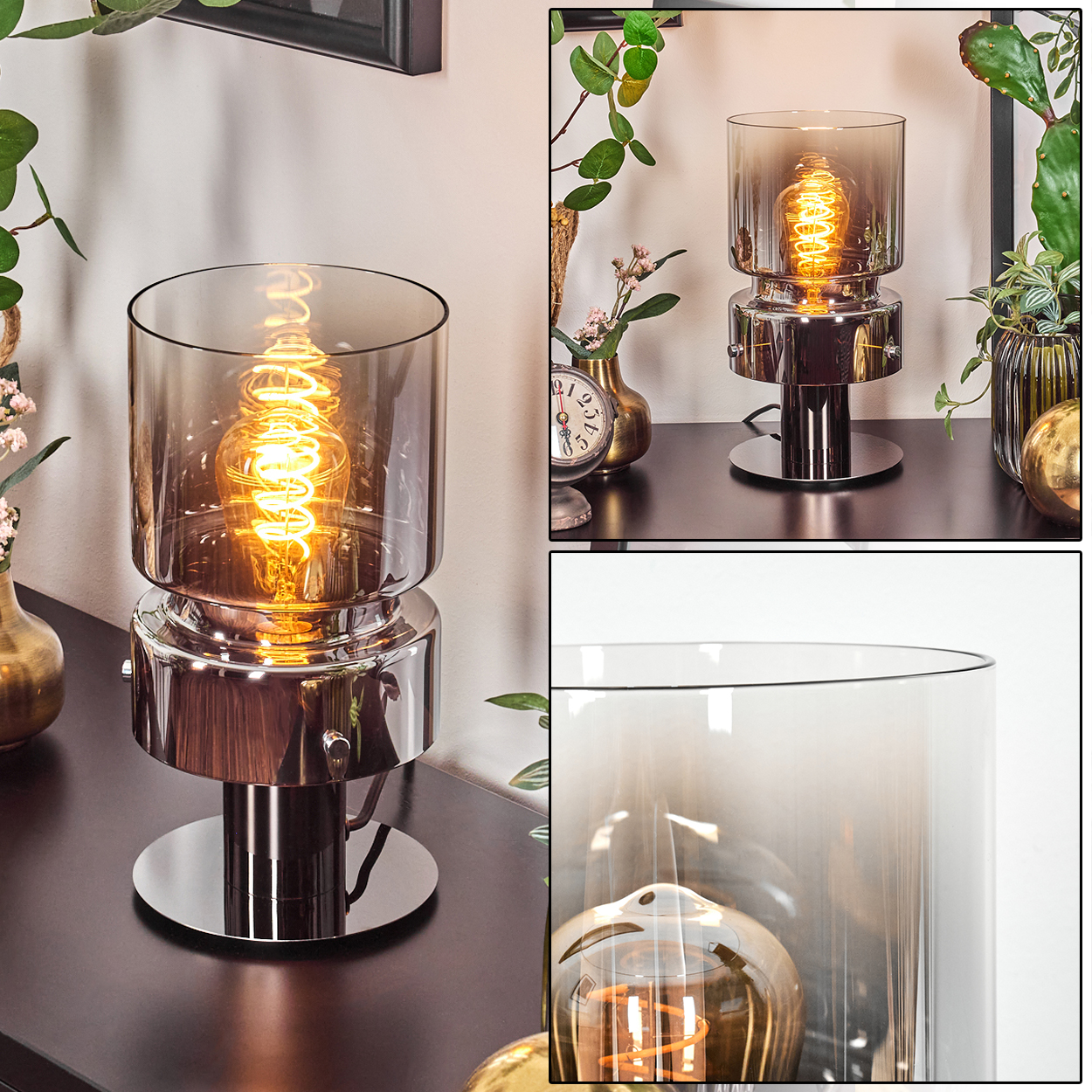 Eine moderne Lampe mit rauchfarbenem Glasschirm und sichtbarer, spiralförmiger Glühbirne, platziert auf dunkler Oberfläche, Pflanzen im Hintergrund.
