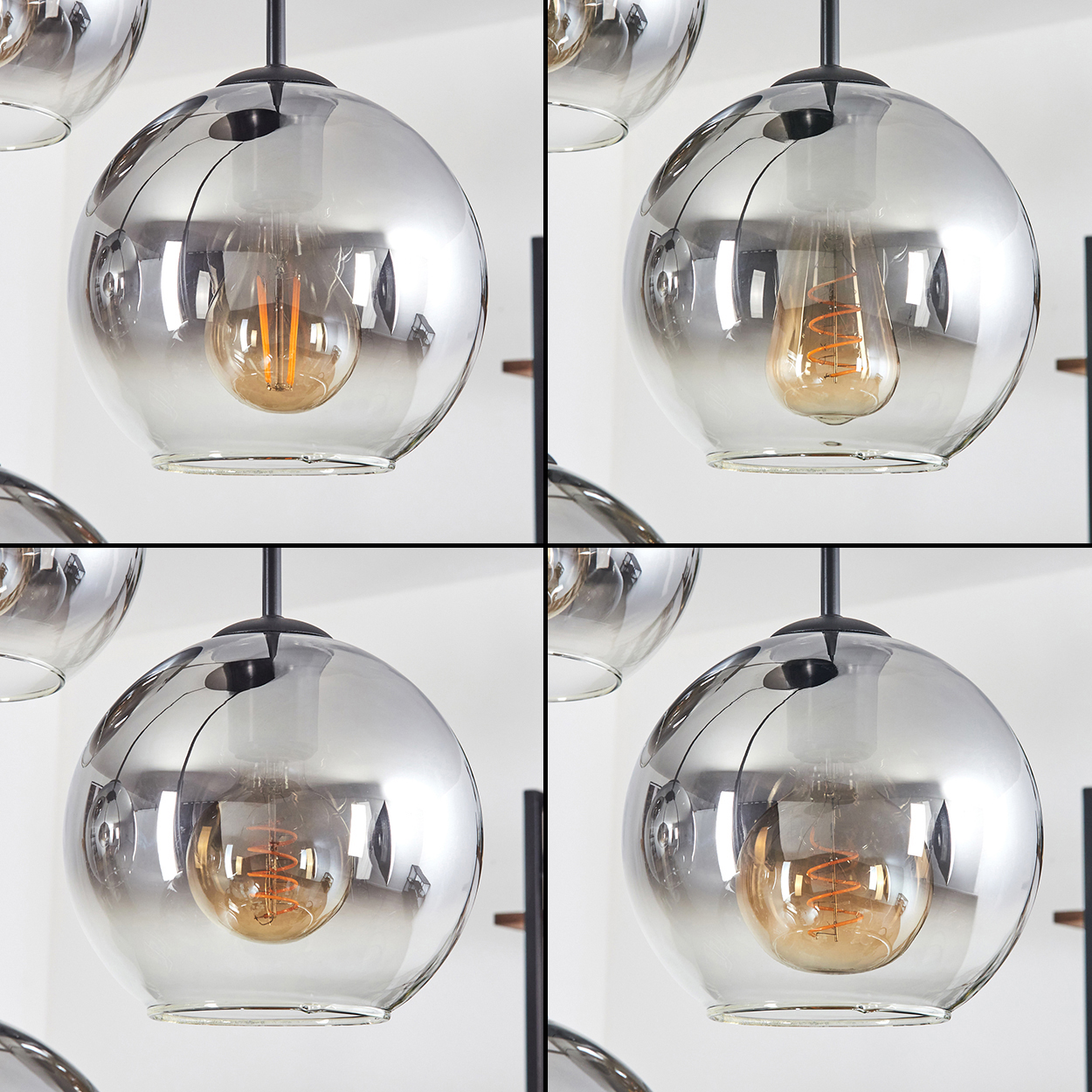 Vier kugelförmige Pendelleuchten mit rauchfarbenen Glasschirmen. Jede hat eine warmtonige Glühbirne. Der Hintergrund ist weiß.