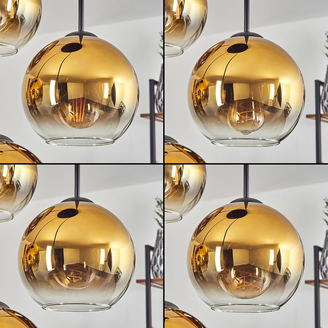 Goldene kugelförmige Pendelleuchten mit sichtbaren Glühbirnen. Schwarze Stiele hängen die Lampen vor einer weißen Wand. Regale und Pflanzen im Hintergrund.