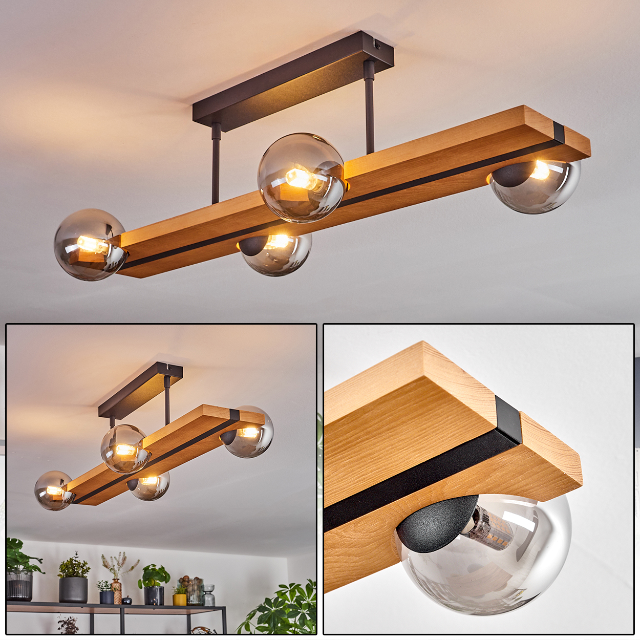 Eine moderne Deckenleuchte mit Holzbalken und kugelförmigen Glasschirmen, die ein warmes Licht ausstrahlen, vor einer weißen Decke.
