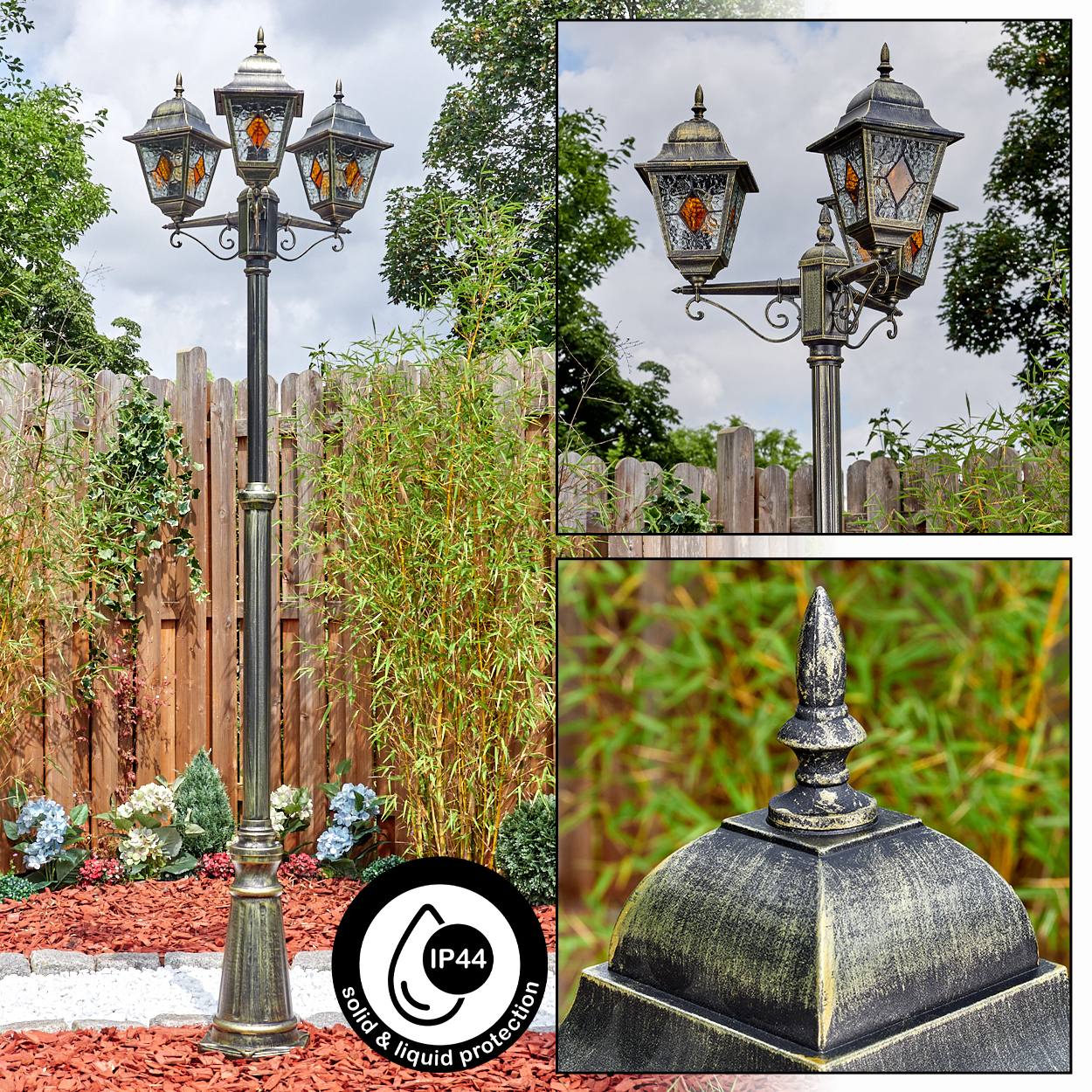 Eine dekorative Außenlaterne mit drei Lampen, vor einem Holzzaun und Grün. Sie hat eine Bronze- und Schwarzausführung.