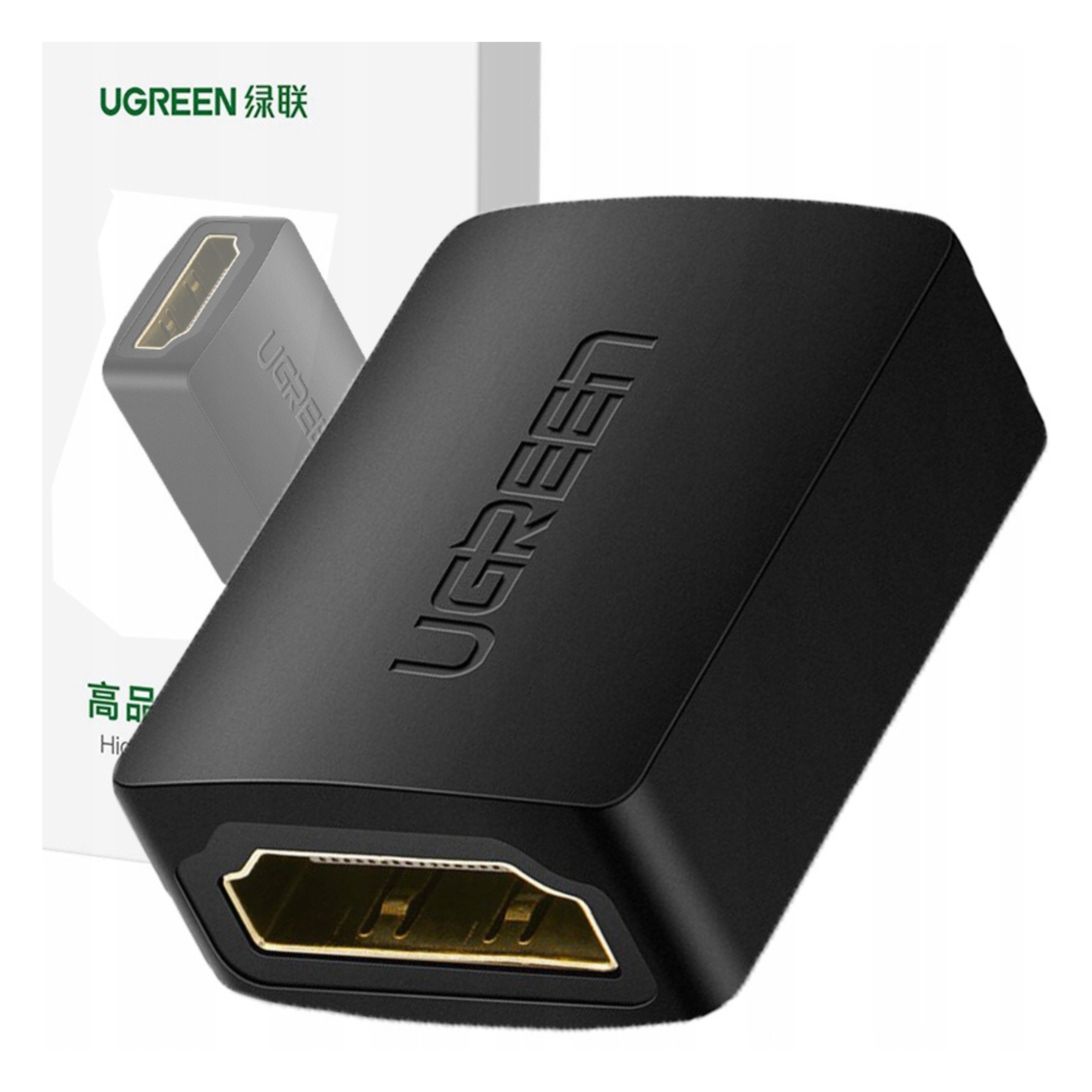 Czarny adapter HDMI UGREEN ze złotym portem, pod kątem na białym tle. Drugi adapter w tle.