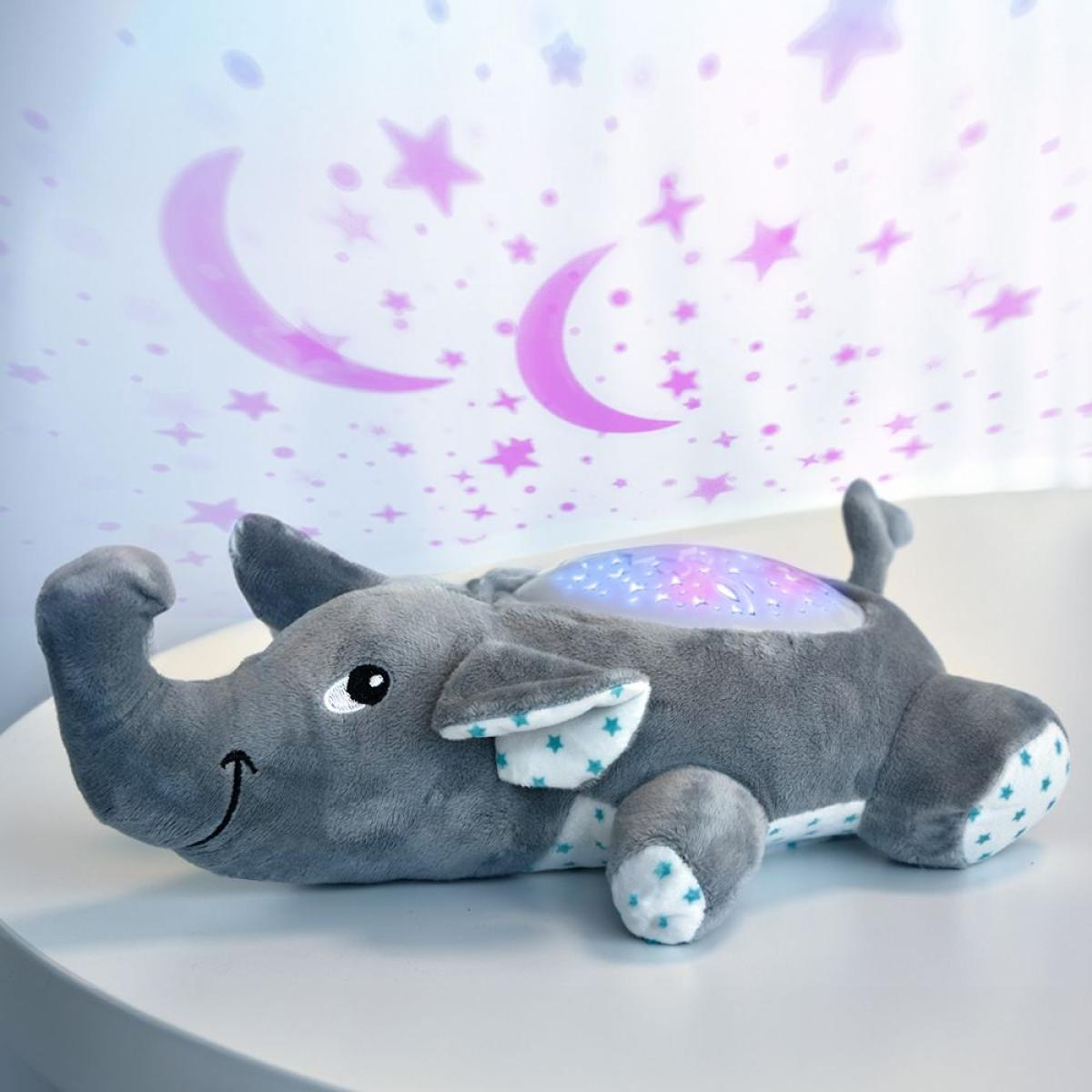 A gray elephant night light projects stars and crescent moons. The elephant has blue star patterns on its ears and feet.