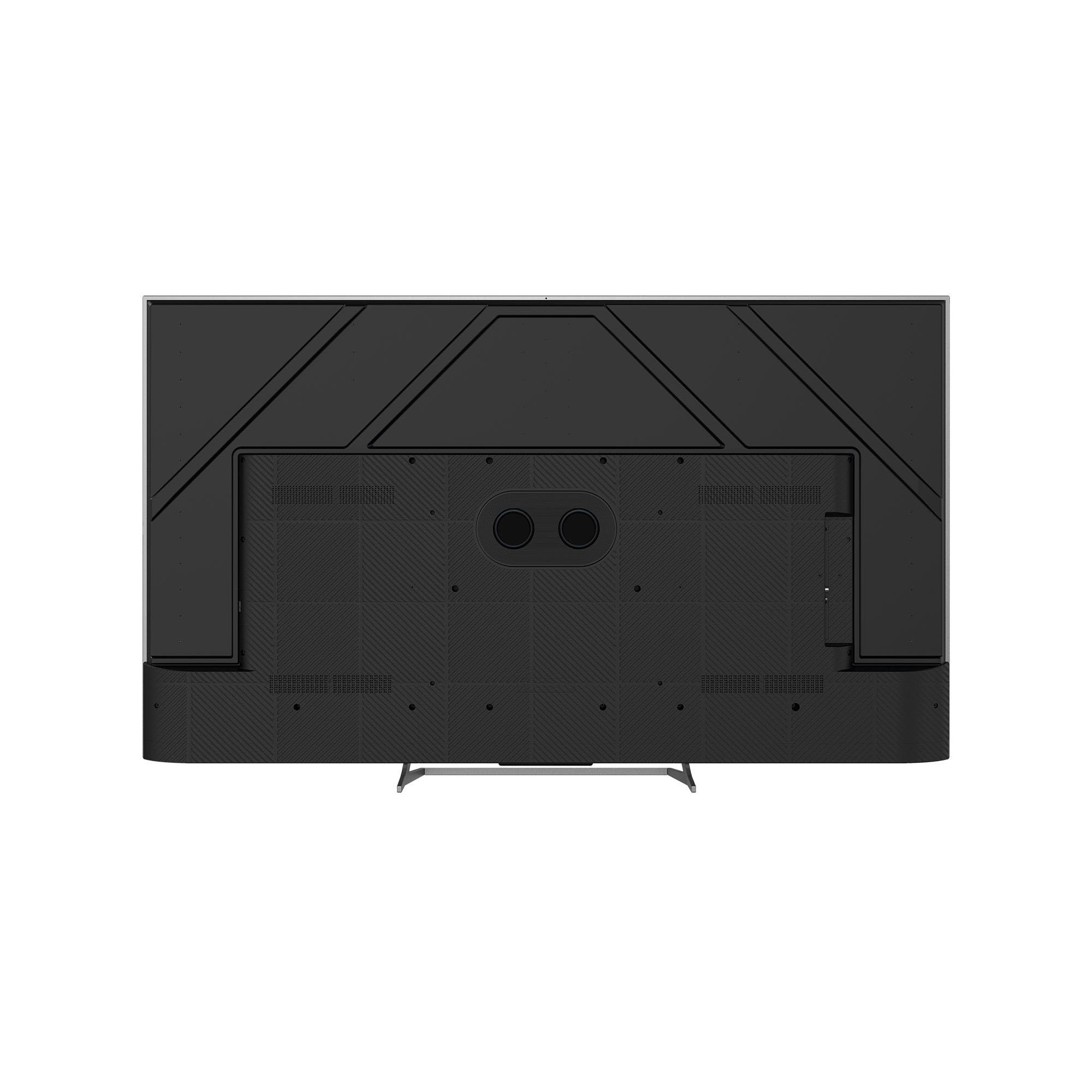 Vista posteriore di una TV nera. Ha un retro a fantasia con prese d'aria e due grandi porte rotonde al centro.