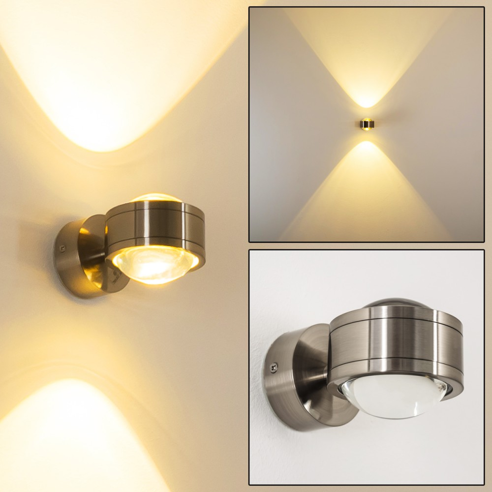 Drei Ansichten einer Wandleuchte aus gebürstetem Metall. Die Lampe hat einen runden Sockel, einen zylindrischen Körper und einen Glasschirm. Das Licht scheint nach oben und unten.