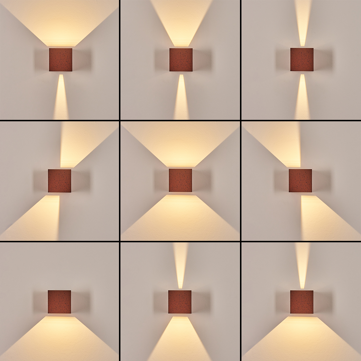 Neun quadratische Wandlampen mit warmem Licht. Jede Lampe hat ein braunes Quadrat in der Mitte. Lichtstrahlen in verschiedene Richtungen.