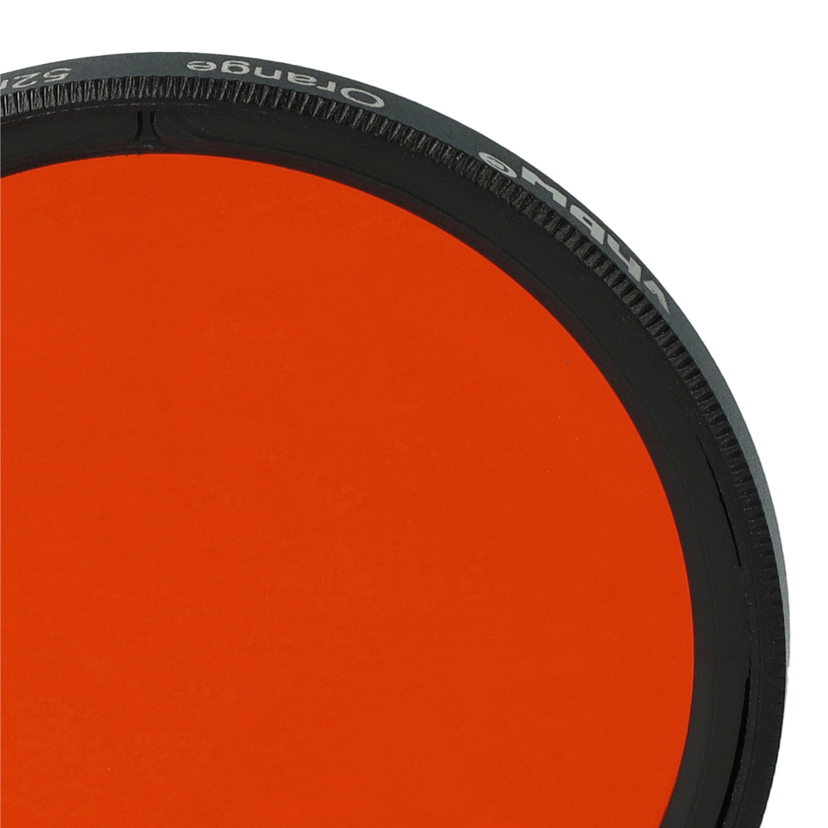 Nahaufnahme einer orangefarbenen Filterlinse. Die Linse hat einen schwarzen Rahmen, Text "Orange" sichtbar.