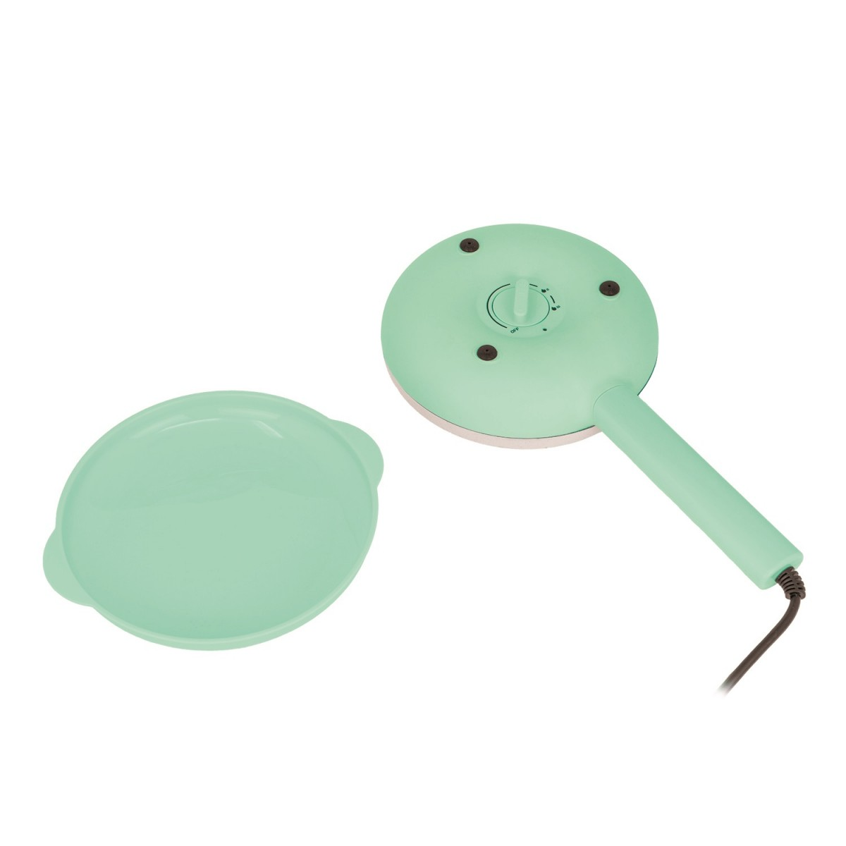 Un electrodoméstico verde menta con superficie de calentamiento redonda y asa. Una tapa a juego está a la izquierda. Un cable de alimentación es visible.