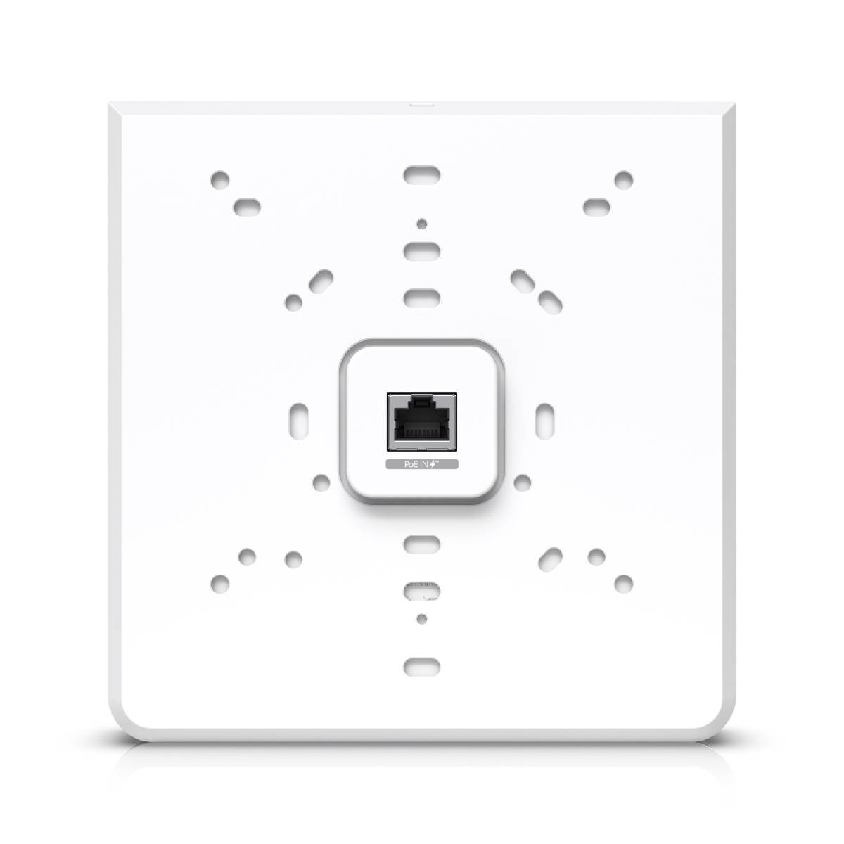 A white square device with an Ethernet port in the center. Multiple holes are around the port. The device is on a white background.