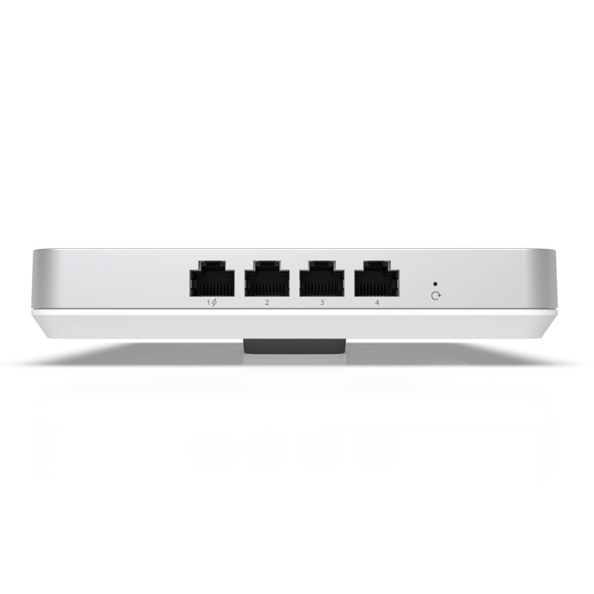 A white network device with four black Ethernet ports labeled 1-4. A power indicator is present. The device is on a white surface.