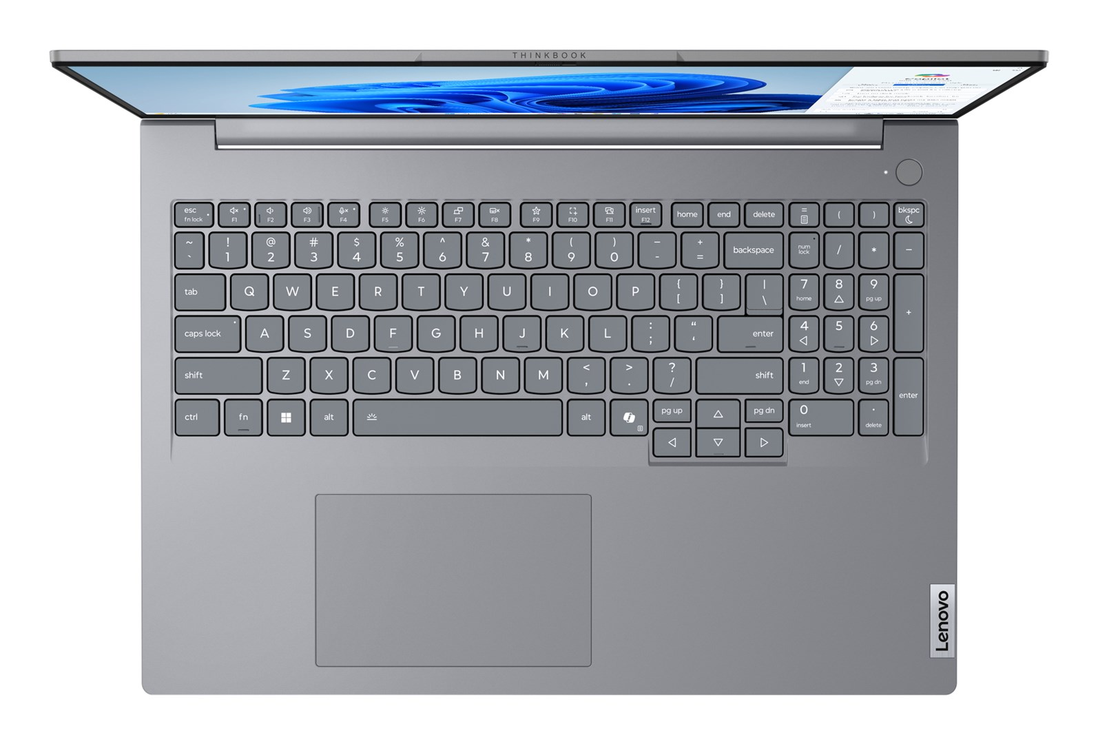 Otwarty laptop Lenovo ThinkBook. Widoczna klawiatura, ekran wyświetla stronę internetową. Szara kolorystyka.