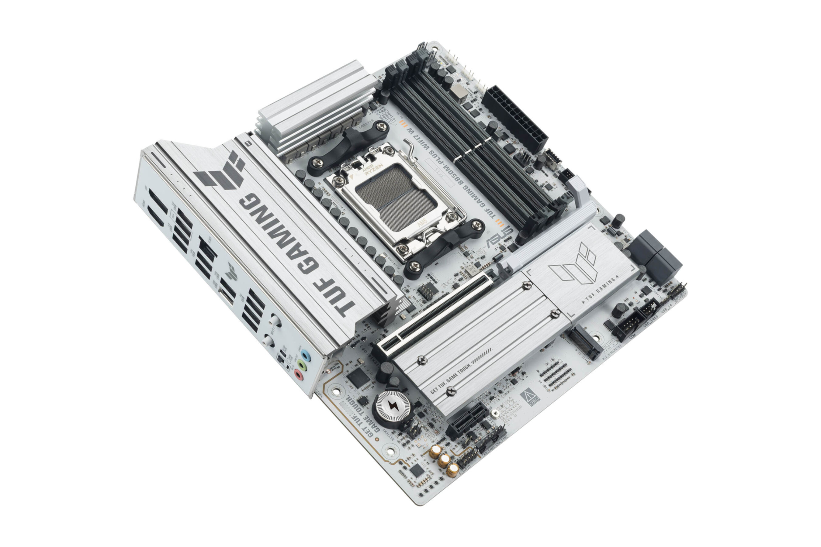 Une carte mère d'ordinateur avec des composants argentés et noirs, dont des emplacements RAM et un socket CPU.
