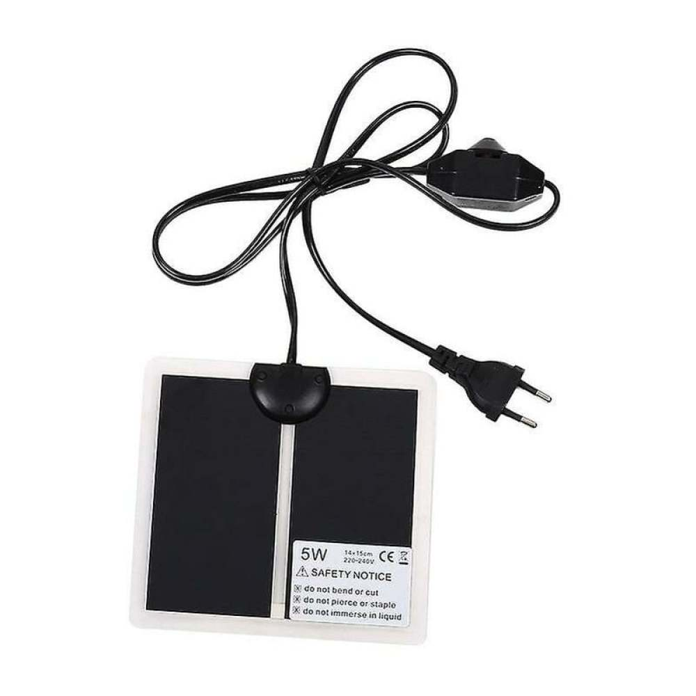 Ein schwarz-weißes Reptilien-Heizkissen mit Netzkabel, Dimmer und Stecker. Es hat einen Sicherheitshinweis mit Anweisungen.