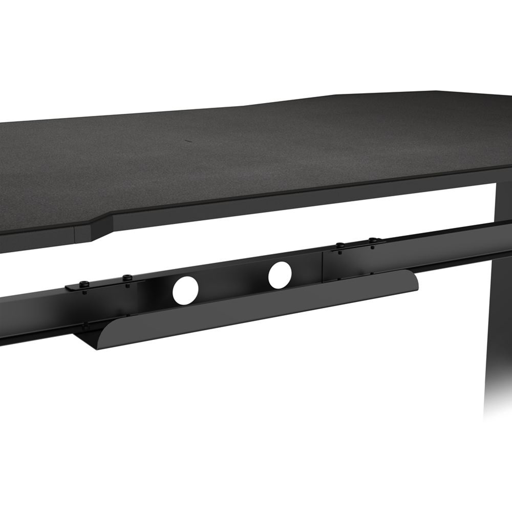Primer plano de un escritorio negro con dos agujeros circulares blancos, un soporte de metal negro y una superficie negra.