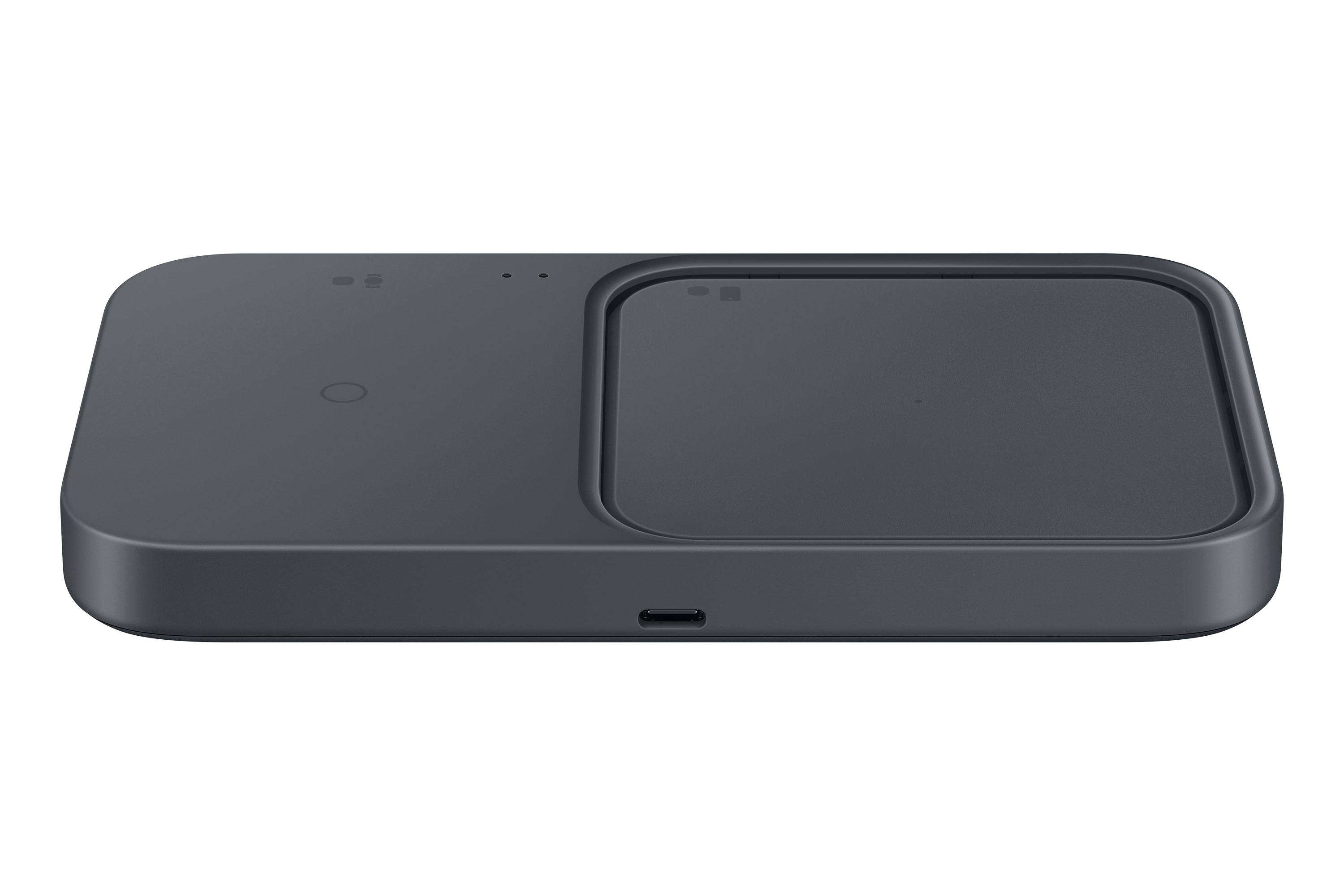 Ciemnoszara ładowarka bezprzewodowa. Ma dwie podkładki ładujące, port USB-C i wskaźniki.